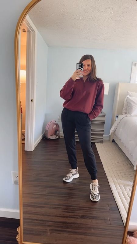 On the go outfit! 

The best black joggers from amazon and my favorite streamline leopard APL tennis shoes. Also loving this burgundy half zip pull over! 



#LTKfitness #LTKshoecrush #LTKsalealert