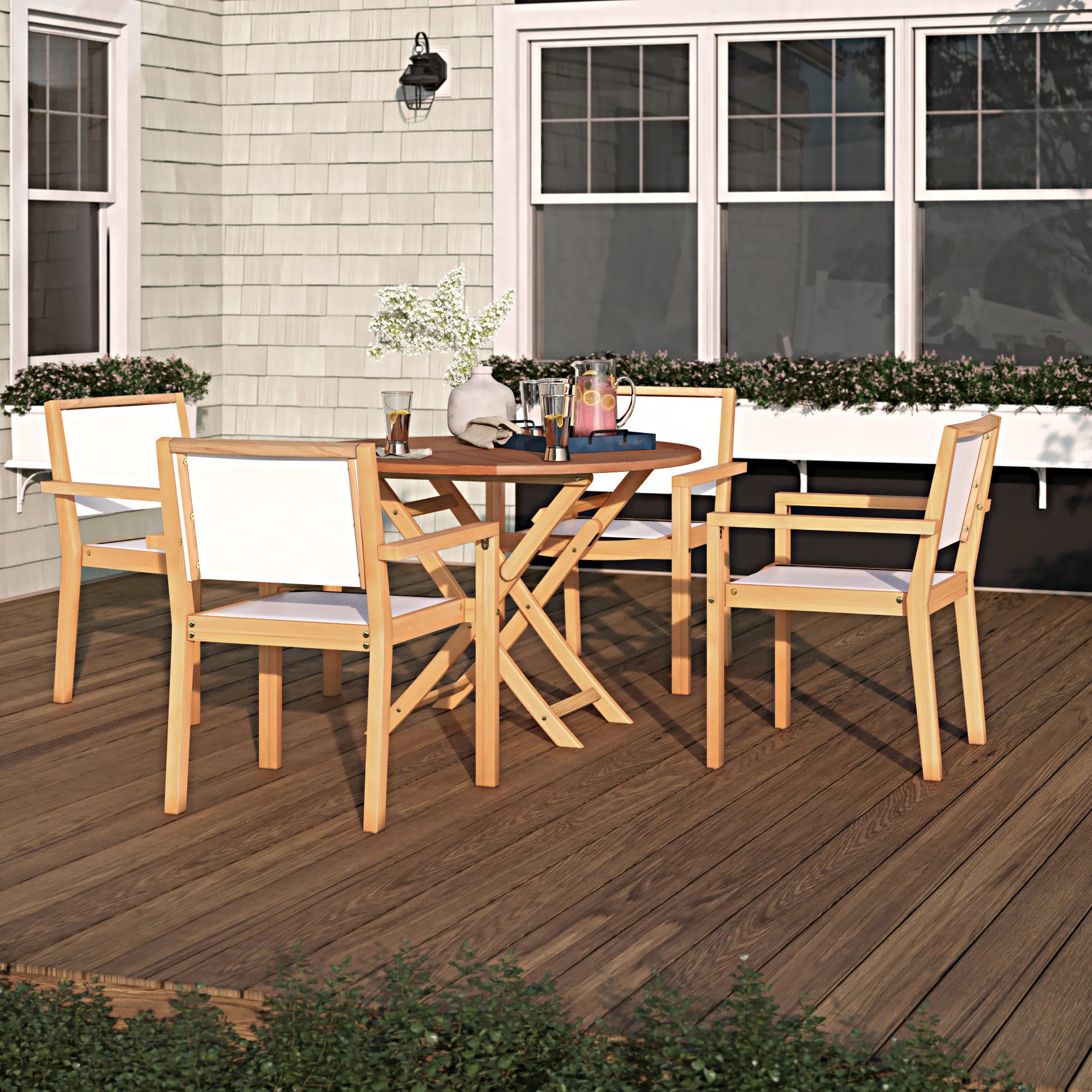 Keziah 4 - Person Patio Dining Set with Round Table | Wayfair North America