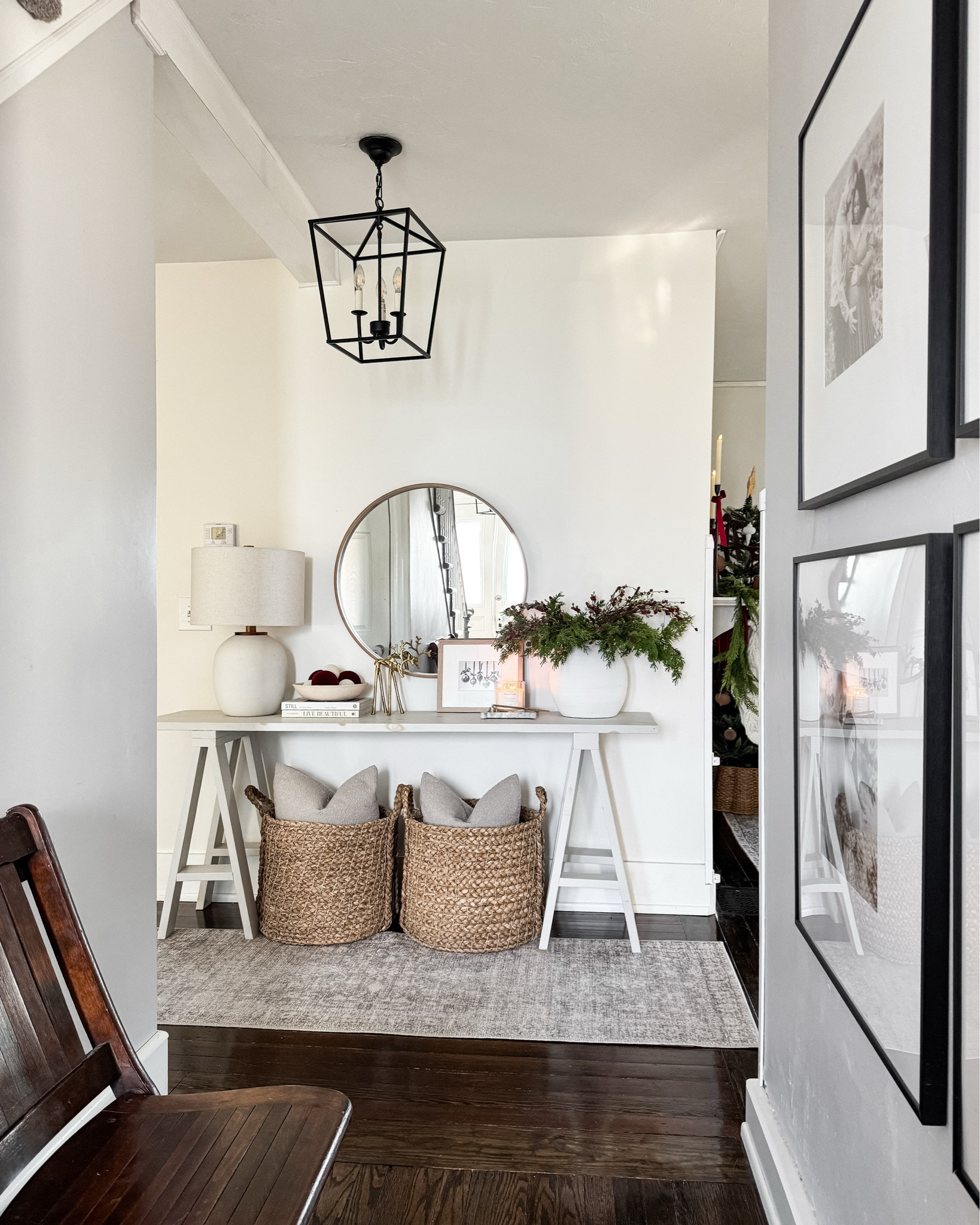 A cozy, neutral Christmas entry moment—layered baskets, warm lighting, and simple greenery for that welcoming holiday feel 🎄✨

Christmas console decor, entryway Christmas decor, neutral Christmas entry, holiday console table, Christmas home decor, entryway styling, woven baskets decor, round mirror console, Christmas greenery decor, cozy holiday entry 

 

#LTKHoliday #LTKSeasonal #LTKHome