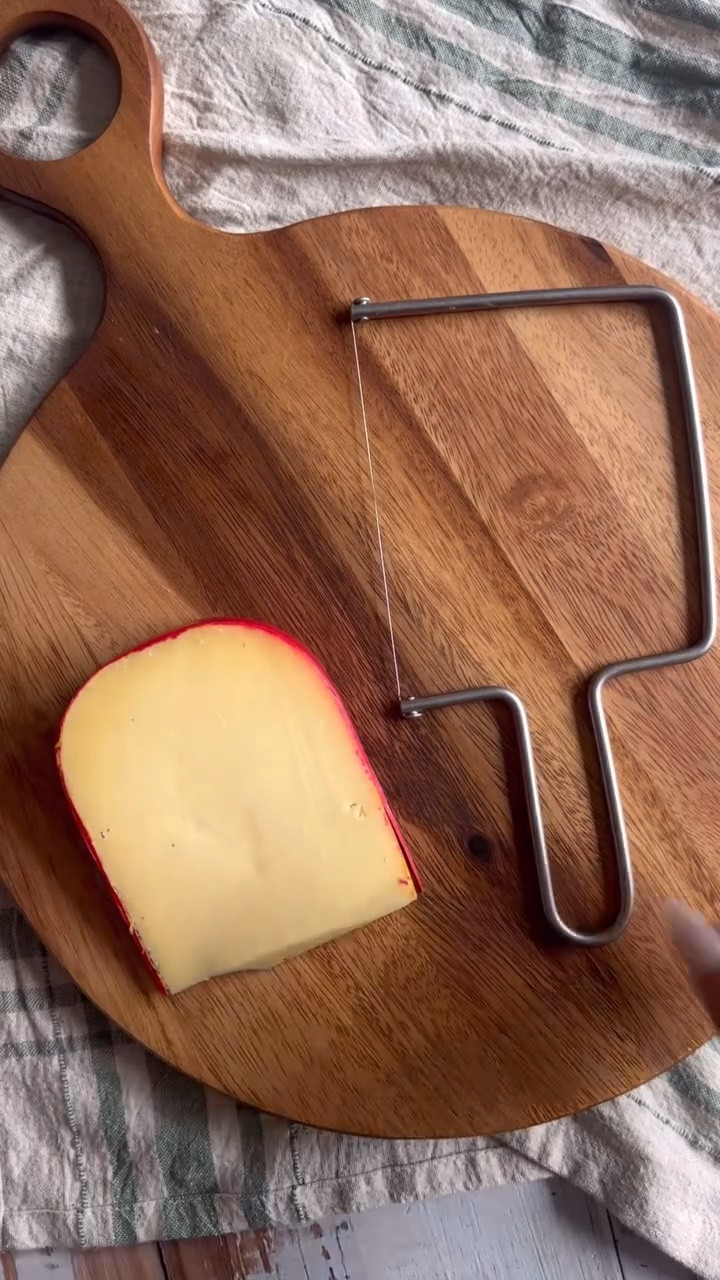 🔗 Want to elevate your cheese game? COMMENT SLICER to get the link to this affordable gadget sent directly to your DMs!

GOUDA STYLING HACK⬇️

Take your Gouda presentation to the next level with this simple hack! With just a handheld cheese slicer and its ICONIC red wax casing, you can create a show-stopping centerpiece for your next board.

What You’ll Need:
- Handheld cheese slicer
- Knife

How-To
1️⃣ Hollow Out the Wax Casing – Use your slicer to carefully cut around the edge of the Gouda, removing the top portion of the red wax. You can decide how thick or thin you want to slice.

2️⃣ Save the Cheese – Scoop out the Gouda and cube or slice it for snacking or plating later.

3️⃣ Create the Display – Add the cubed cheese back into the hollowed-out wax casing for a fun and eye-catching way to serve your Gouda!

⚠️ Disclaimer: Gloves weren’t used here for demo purposes. Always wash your hands and follow food safety protocols when serving guests.

SAVE this post and FOLLOW @charcuterie_n_things for more creative food styling tips and tricks!

#foodstyling #cheeselover #charcuterieandthings #easyentertaining #charcuterieboard #fyp #amazonfinds