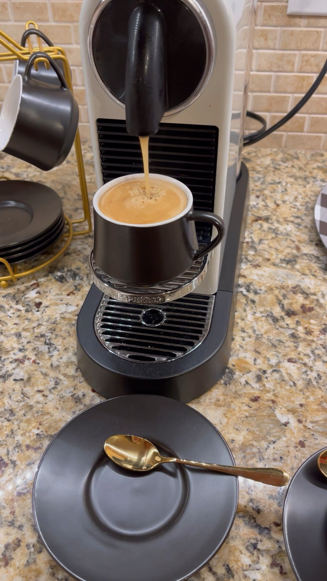 Nespresso CITIZ!  Such a pretty machine!  (A little loud but makes yummy espresso and so easy!)  Goes great with the little black espresso cups, saucers and gold spoons from Amazon!  Package it all as a luxurious gift for someone you love to have delicious espresso every day!  #espresso #nespresso 

#LTKGiftGuide #LTKFind