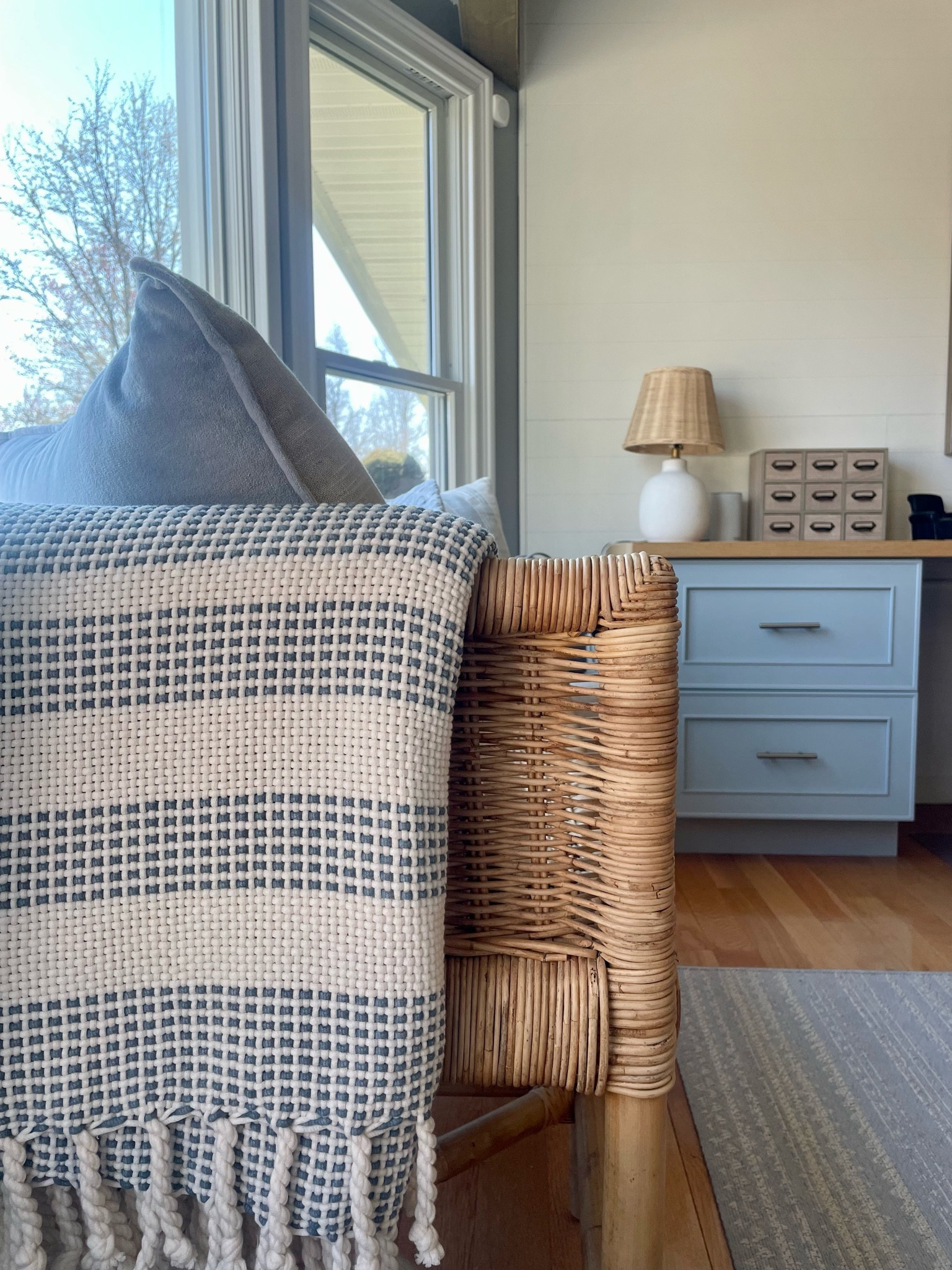 Loving the mix of soft blues with warm wicker tones—this combo brings effortless serenity to any space. Shop all my faves: the perfect blue throw, rattan lamp and wicker bench.

#LTKhome #coastaldecor #wickerlove #neutralstyle #bluedecor #homeinspo