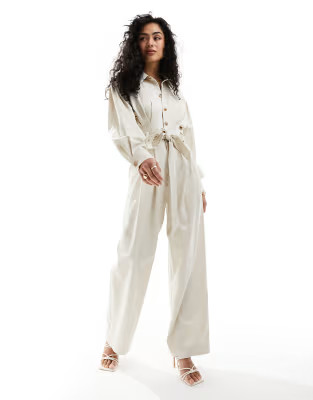 & Other Stories long sleeve jumpsuit with button front and tie waist in light beige | ASOS (Global)
