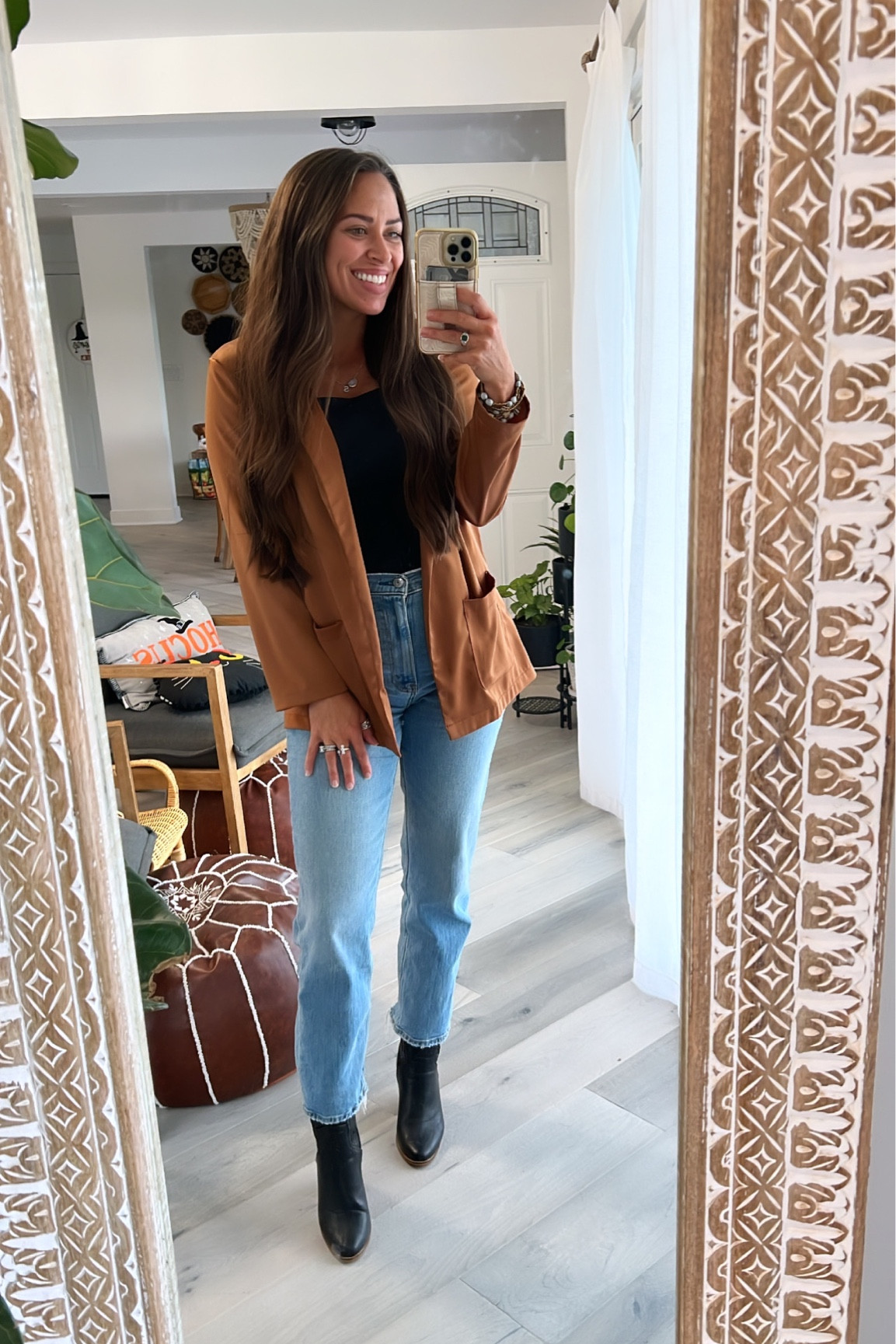 rust brown satin blazer, popular Amazon bodysuit tank (multiple colors!), Abercrombie high rise mom jeans, black cowboy western style ankle boots! 

#LTKunder50 #LTKstyletip #LTKunder100