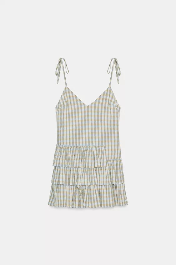 V-neck dress with adjustable thin straps with a bow. Featuring a contrast lining, a ruffled hem a... | Zara UK