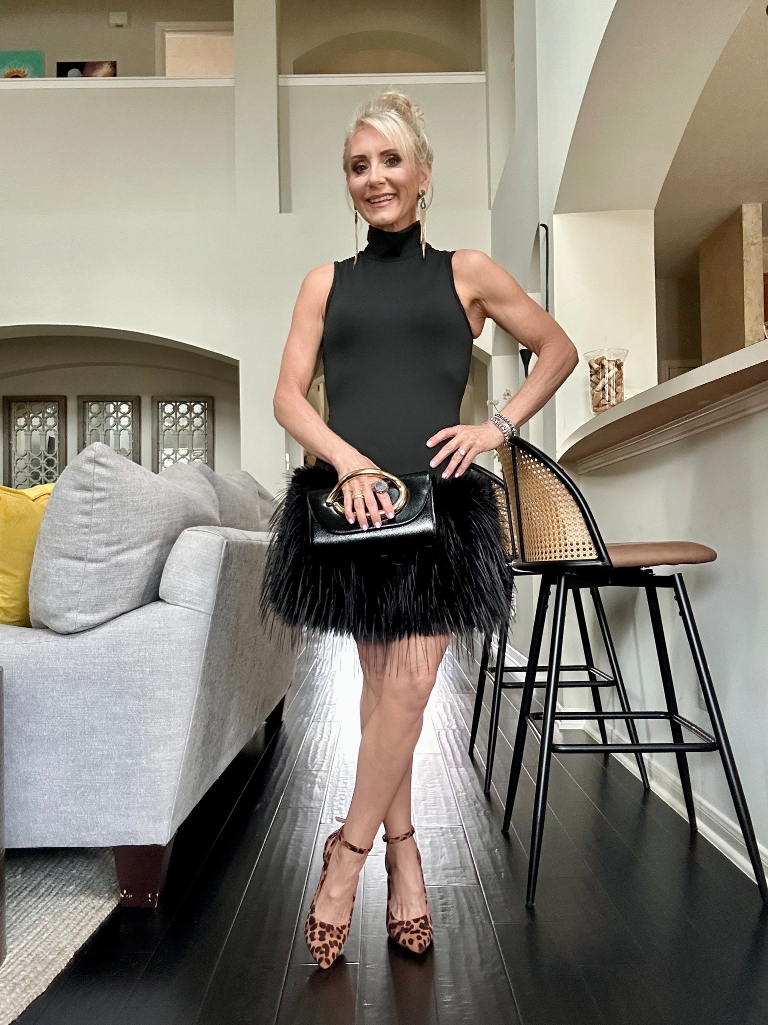 Elegance + a little of the untamed.  Wearing an XS.  Gala dress. Event dress. Little black dress. LBD. Special event dress. Feather dress.  Fur dress. Animal print. 

#LTKootd #LTKPetite