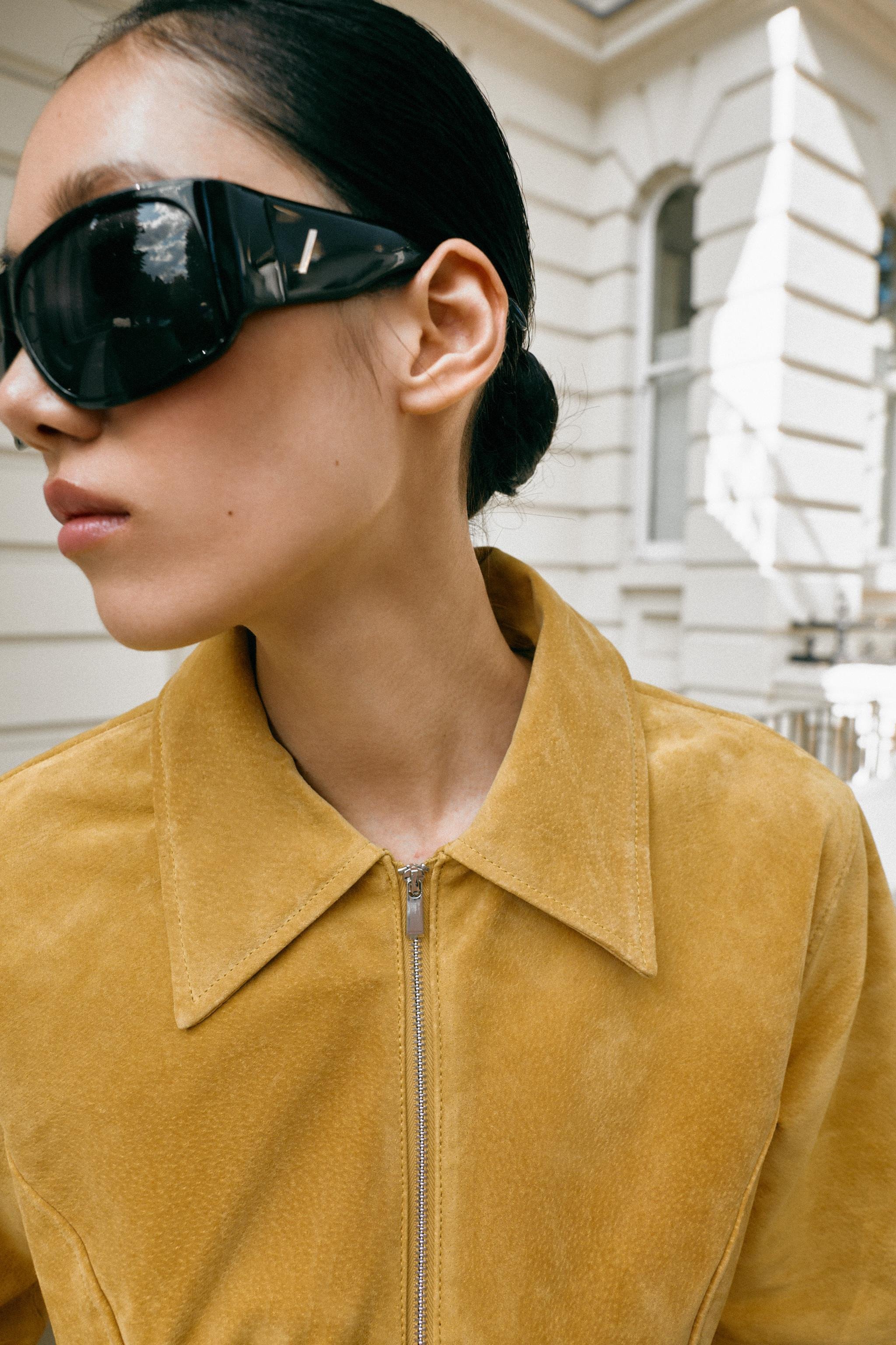 Dress crafted from 100% leather. Featuring a regular collar, short sleeves, front patch pockets w... | Zara UK