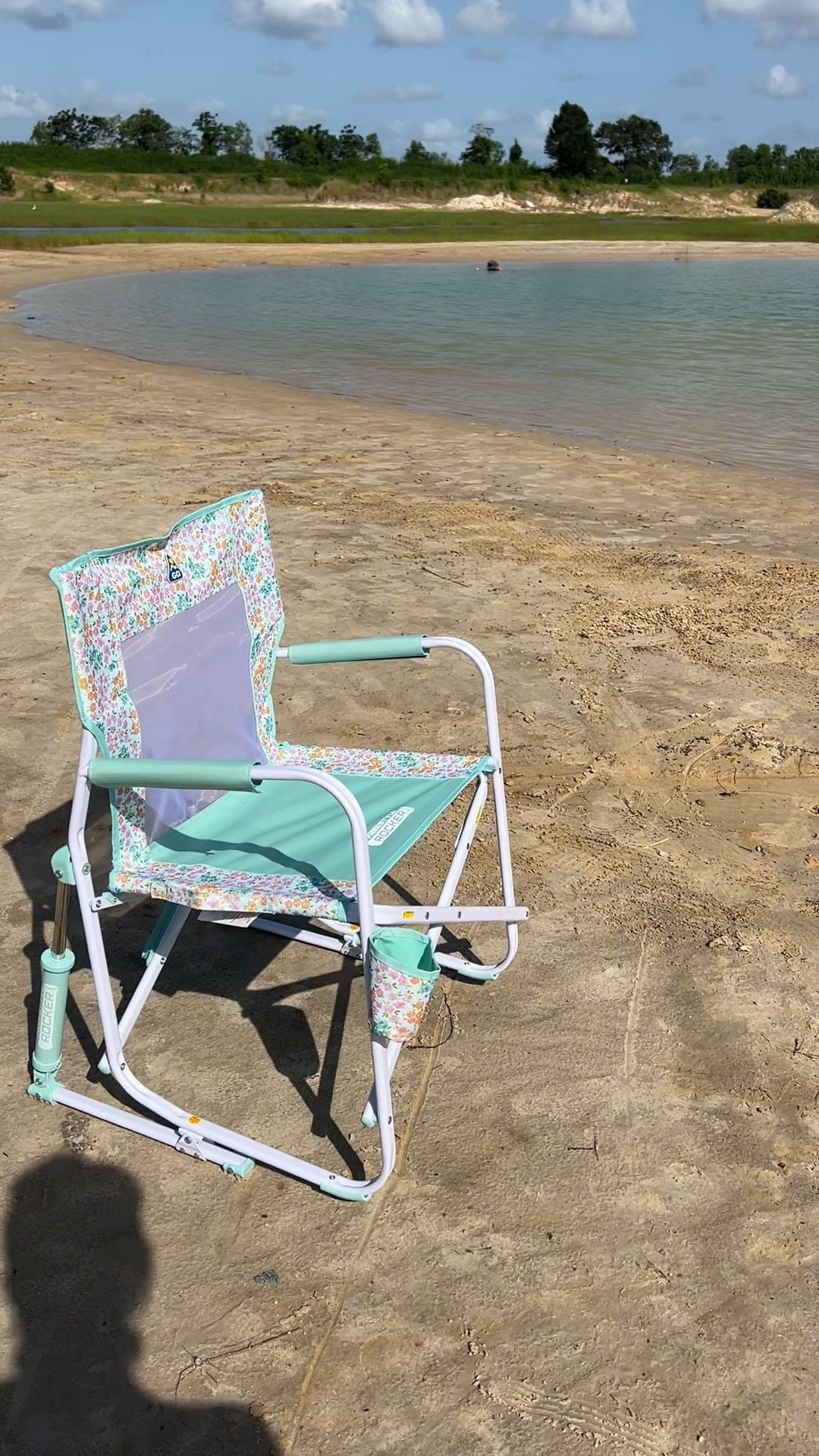 Loving my new GCI Outdoor Freestyle Rocker chair! So many cute prints to choose from too!! #gcioutdoor @GCI Outdoor #lakelife #beachlife #momlife #momsoftiktok #FrontRowSeatToLife #YourComfortZone 

#LTKSwim #LTKFamily #LTKSeasonal