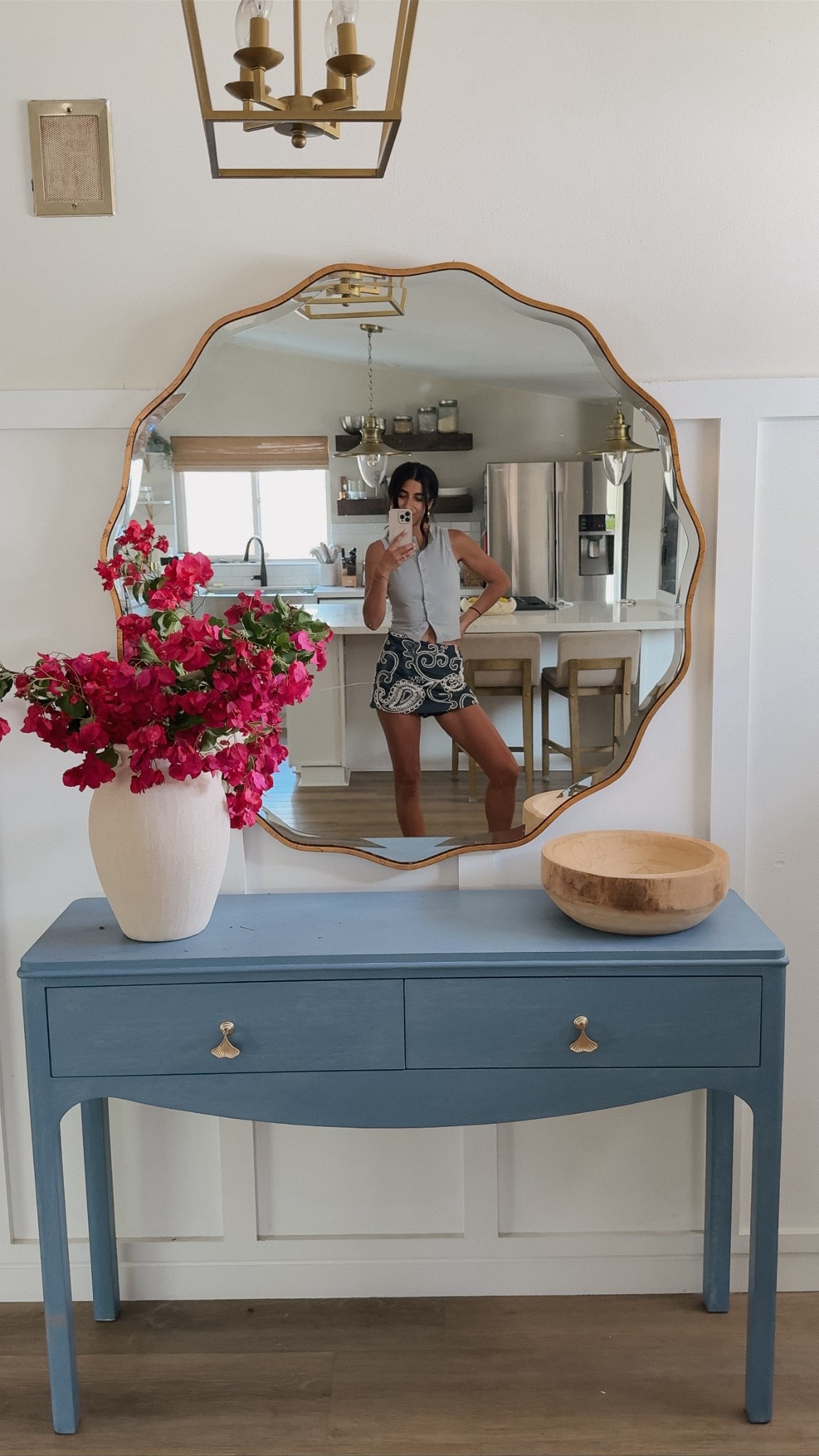 Entryway inspo, grandmillenial blue console, blue accents, scalloped mirror 

Wearing size S in top and skort! 