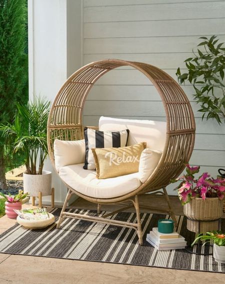 Modern wicker egg chair is so cute for summer patios.  Outdoor furniture, indoor outdoor rug

#LTKStyleTip #LTKHome #LTKSeasonal
