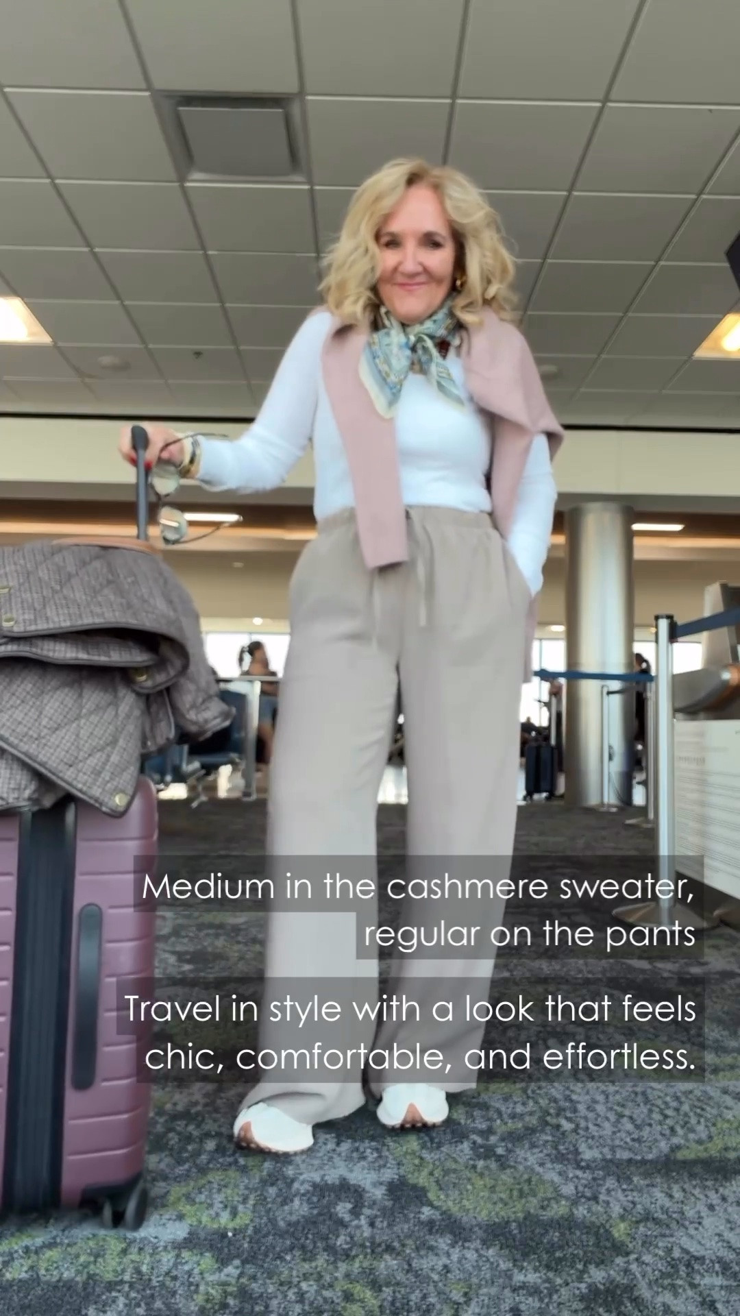 This travel outfit is all about comfort without looking sloppy. Soft wide-leg pants, a simple white top, a draped sweater, and a pretty scarf make an easy airport look that feels polished from takeoff to arrival.

💡 LTK MADE EASY
❤️ Heart = Support my posts!
🔖 Save = Get sale & restock alerts
📋 Lists = Keep favorites organized
📲 Share = Send lists and products to a friend. Hello, Christmas List!
💬 Comment = Ask me anything about what I'm wearing.:-)

#LTKootd #LTKTravel #LTKOver40