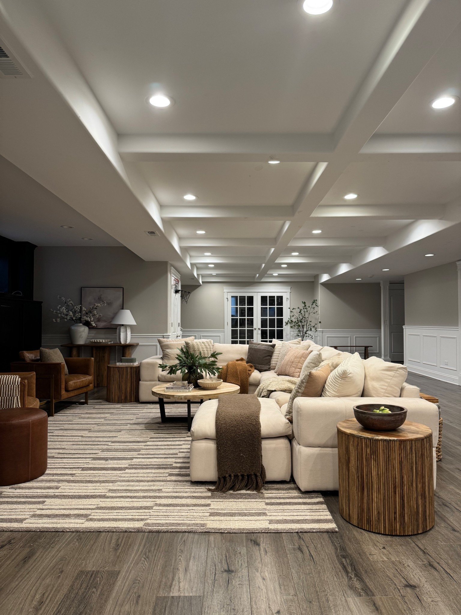 Basement views! We added a lot of wood tones, textures, creams and beige to bring warmth to this space. 

#wayfair #loloirug #loloi #rug #wayfairfinds #sectional #jossandmain #basement #arearug #livingroomrefresh #consoletable #sidetable #coffeetable 

#LTKHome #LTKSaleAlert #LTKStyleTip