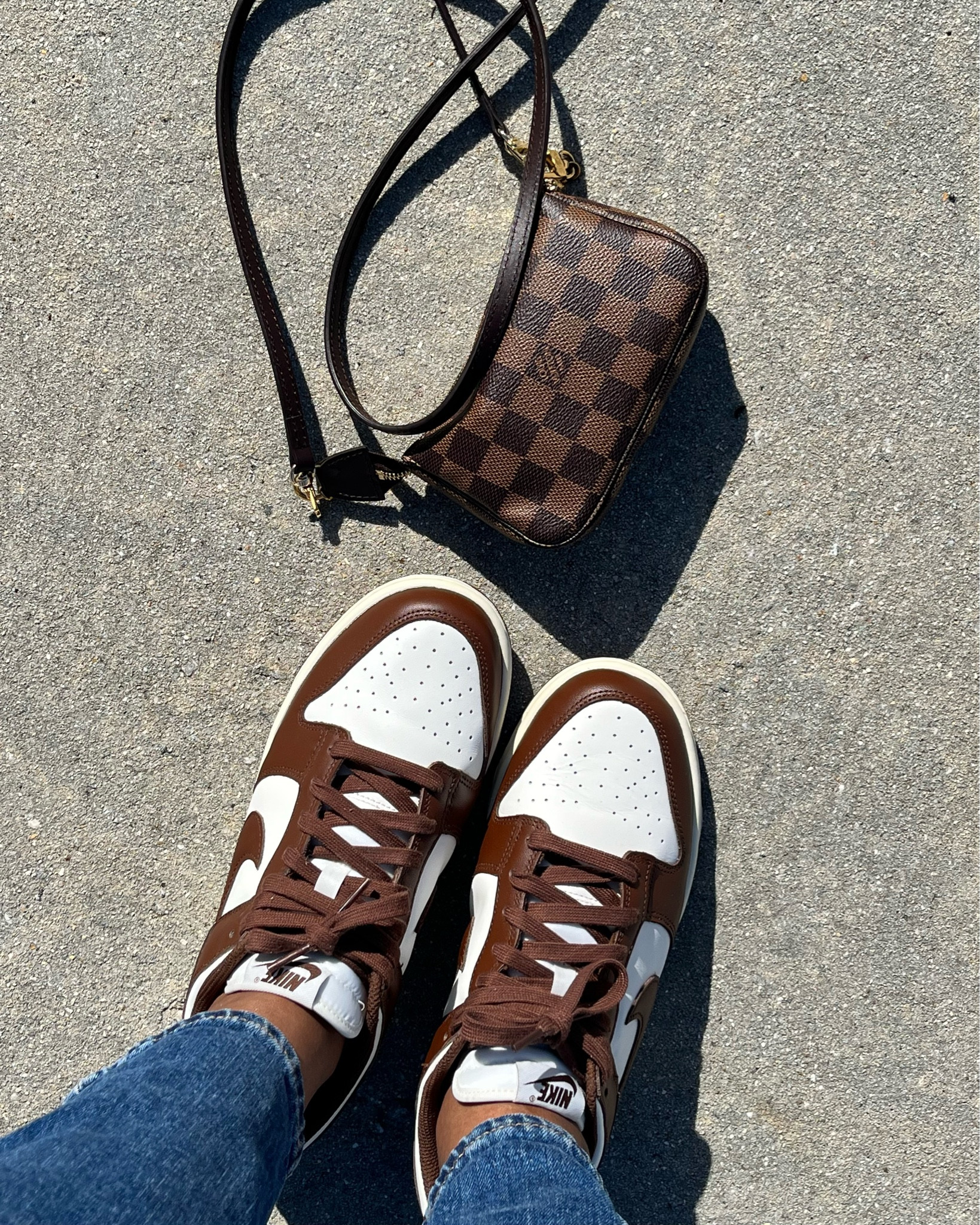 Brown is always in. Love this combo of the Nike dunk low cacao wow and Louis Vuitton mini pouchette accessories in damier ebene.  I added a crossbody strap from Etsy. 

Dunks fit tts  

#browndunks #nikedunk #louisvuitton

#LTKstyletip #LTKitbag