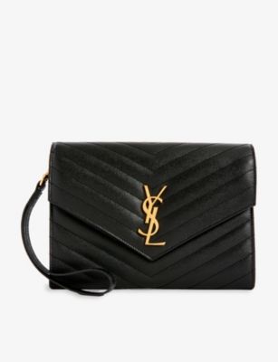 SAINT LAURENT Envelope monogram leather pouch | Selfridges