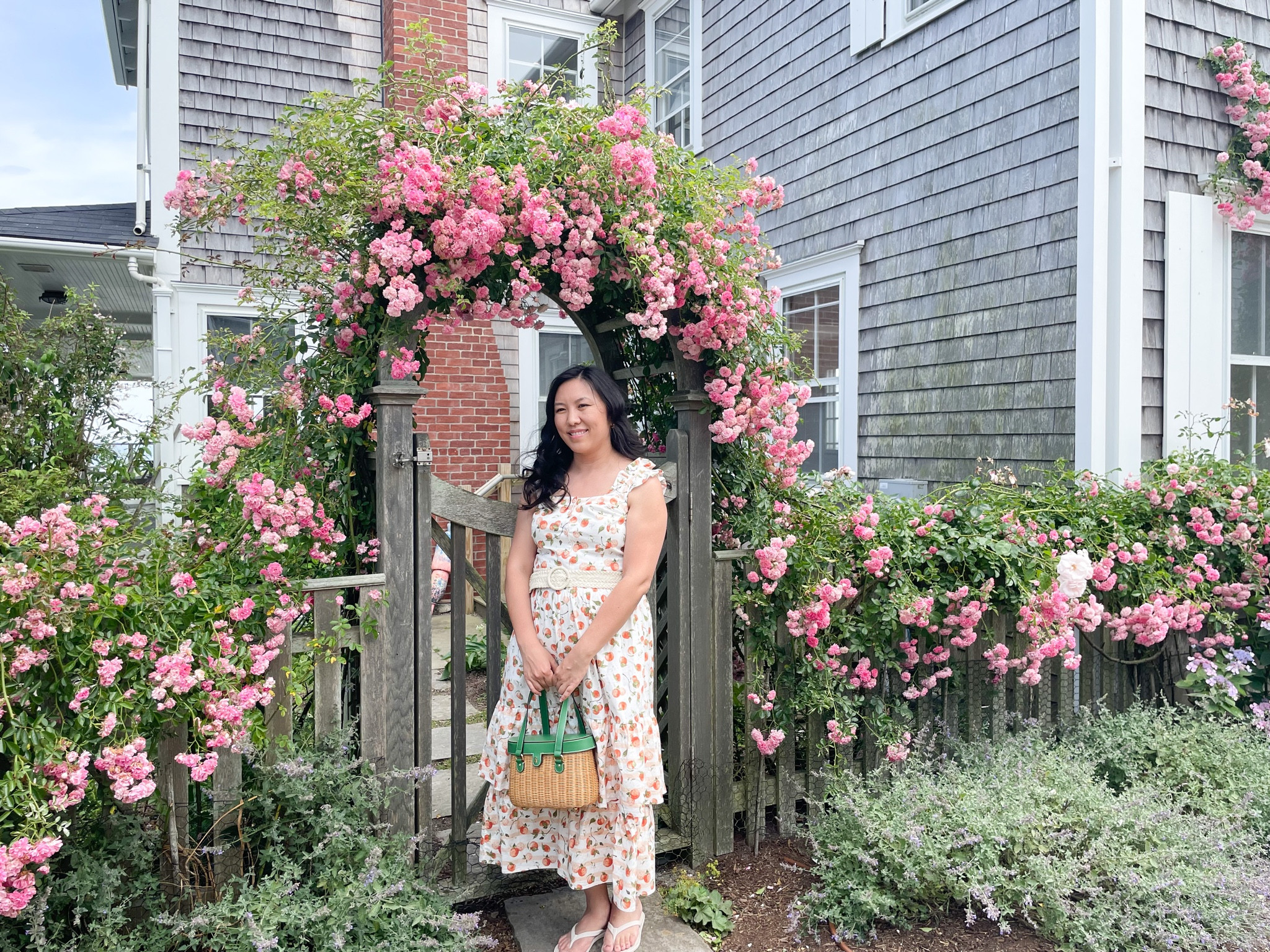 Missing Nantucket. Perfect place to wear a fruit dress with a straw bag.  And admire endless roses 🌹  my straw bag is from Frances Valentine. 