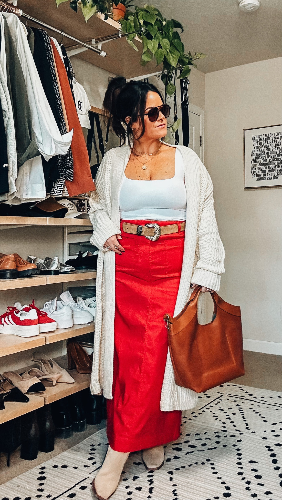 Midsize fall maxi skirt outfit -pop of red the trending color for fall 
Red maxi skirt size xl which is a little loose on me as a size 14 has great stretch 
Cropped double lined tank large 
Duster cardigan large 
Wide calf boots 
Oversized tote bag 


#LTKmidsize #LTKSeasonal #LTKFind