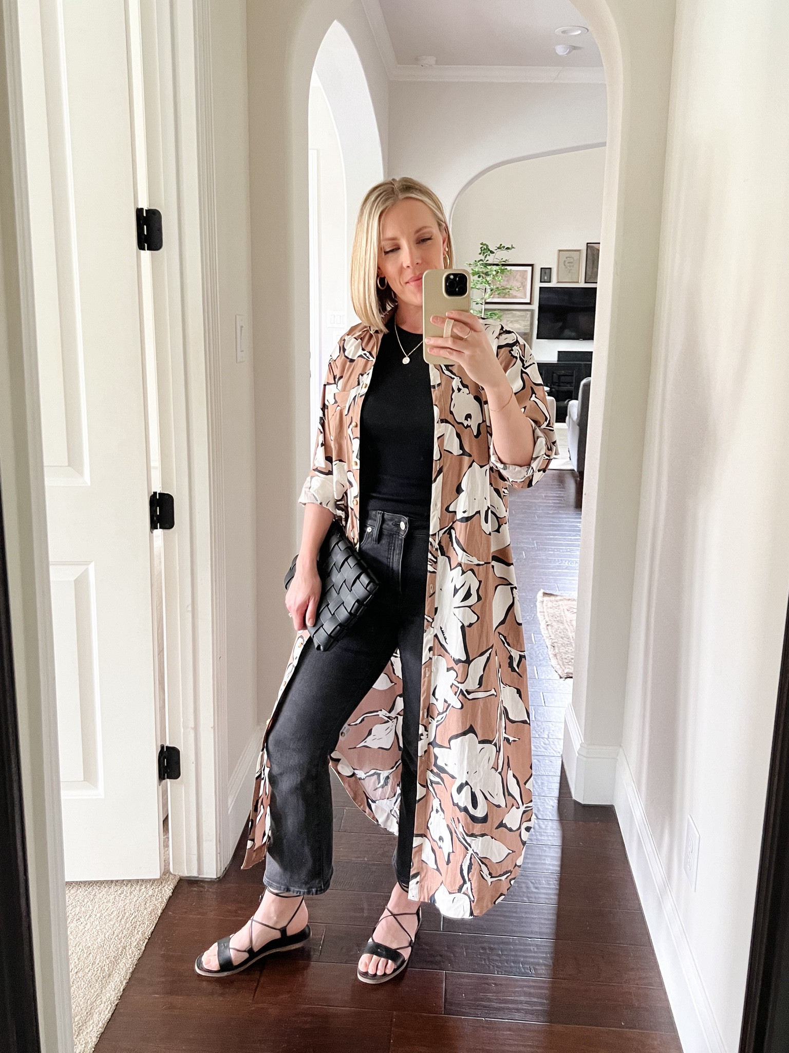 Button front dress worn over black jeans and black tank top with strappy black flat sandals

#LTKhome #LTKover40