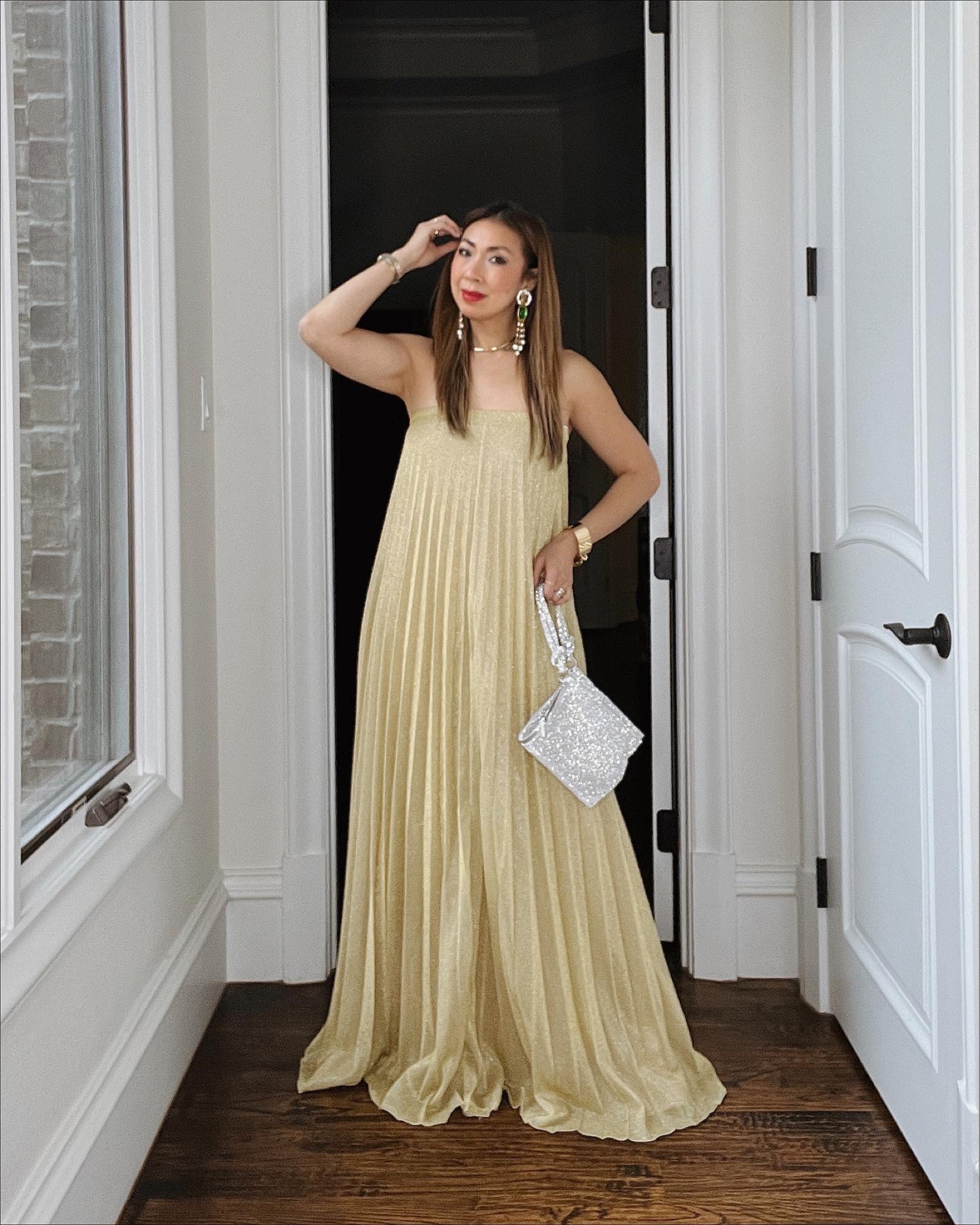 Halston Easy gold pleated strapless gown ✨✨✨

#LTKSeasonal #LTKitbag #LTKHoliday