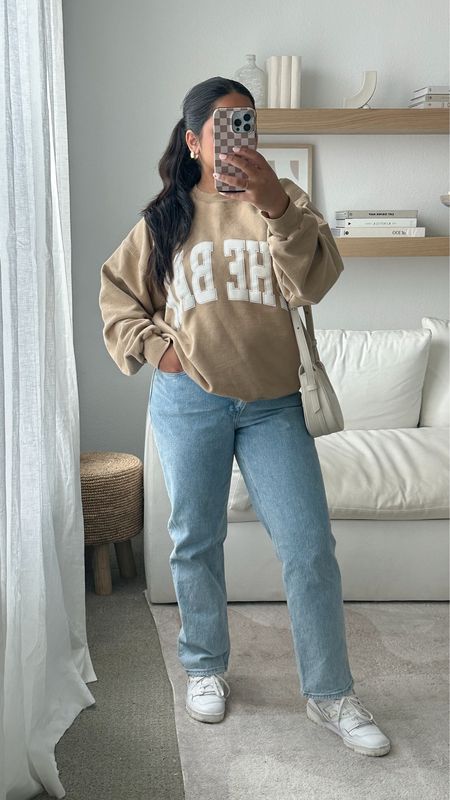 comfy casual outfit for a coffee shop work day 💻

The Bar Sweatshirt, Abercrombie Jeans, New Balance 550s, Gold Jewelry, Chunky Hoops

#LTKstyletip #LTKcurves #LTKshoecrush