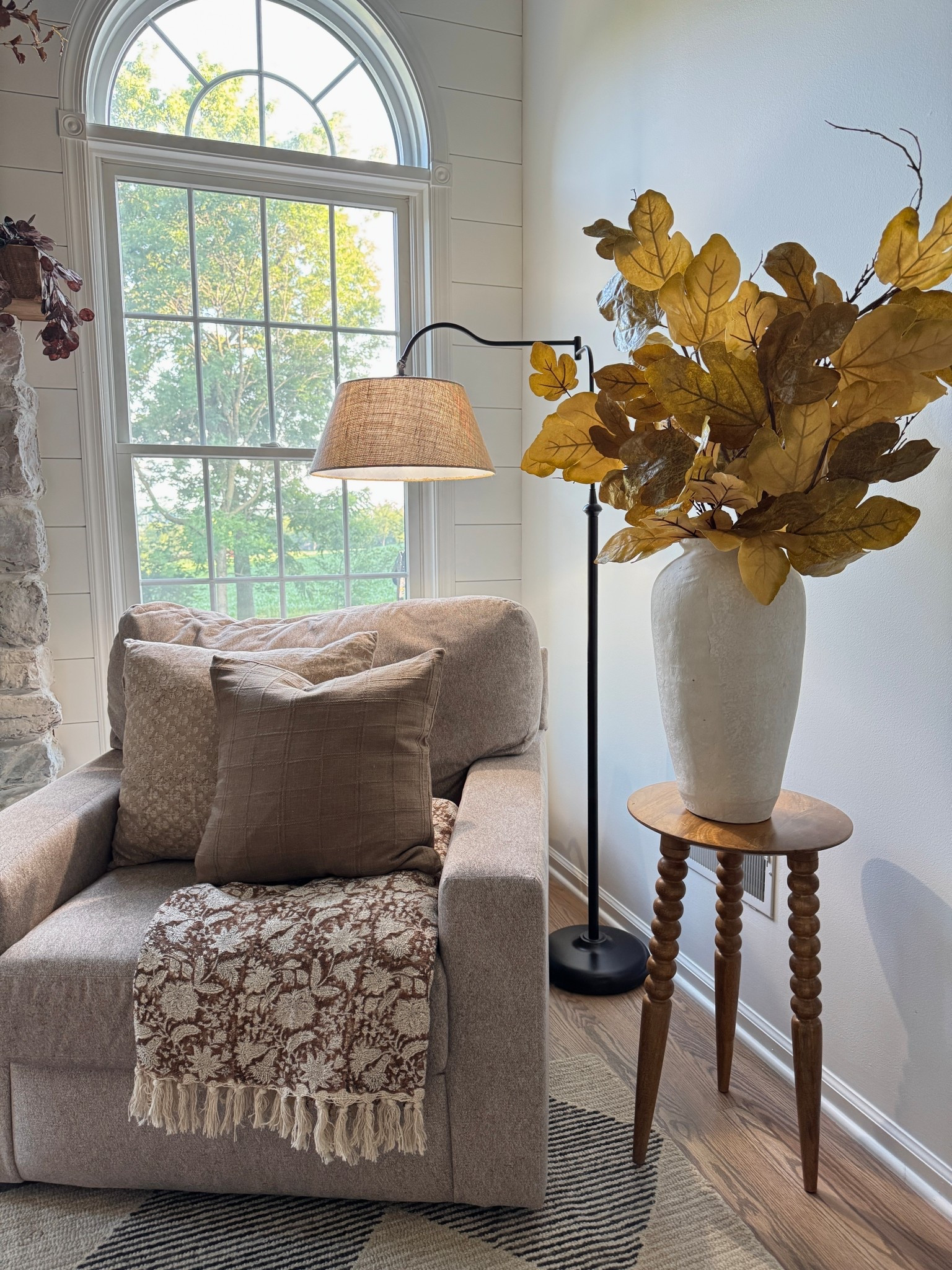 The prettiest vintage looking cream and brown floral print throw, my best selling curved floor lamp with linen shade currently on sale, solid wood accent table, the 47” viral fig leaf stems that come in a pack of six (I have 3 in this vase,) similar large white vase, brown and cream floral throw and throw pillow covers and inserts  

#LTKStyleTip #LTKHome #LTKSaleAlert