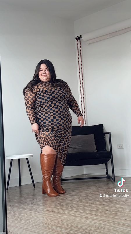Plus size work outfit for the office 
This dress is from ELOQUII and it is sold out, but you can find it on Poshmark! (Wearing a size 18)
I’m wearing wide calf square toed boots from Lane Bryant! 
I’m also wearing shapewear from Amazon under this dress (size 3X)

#LTKmidsize #LTKplussize #LTKworkwear