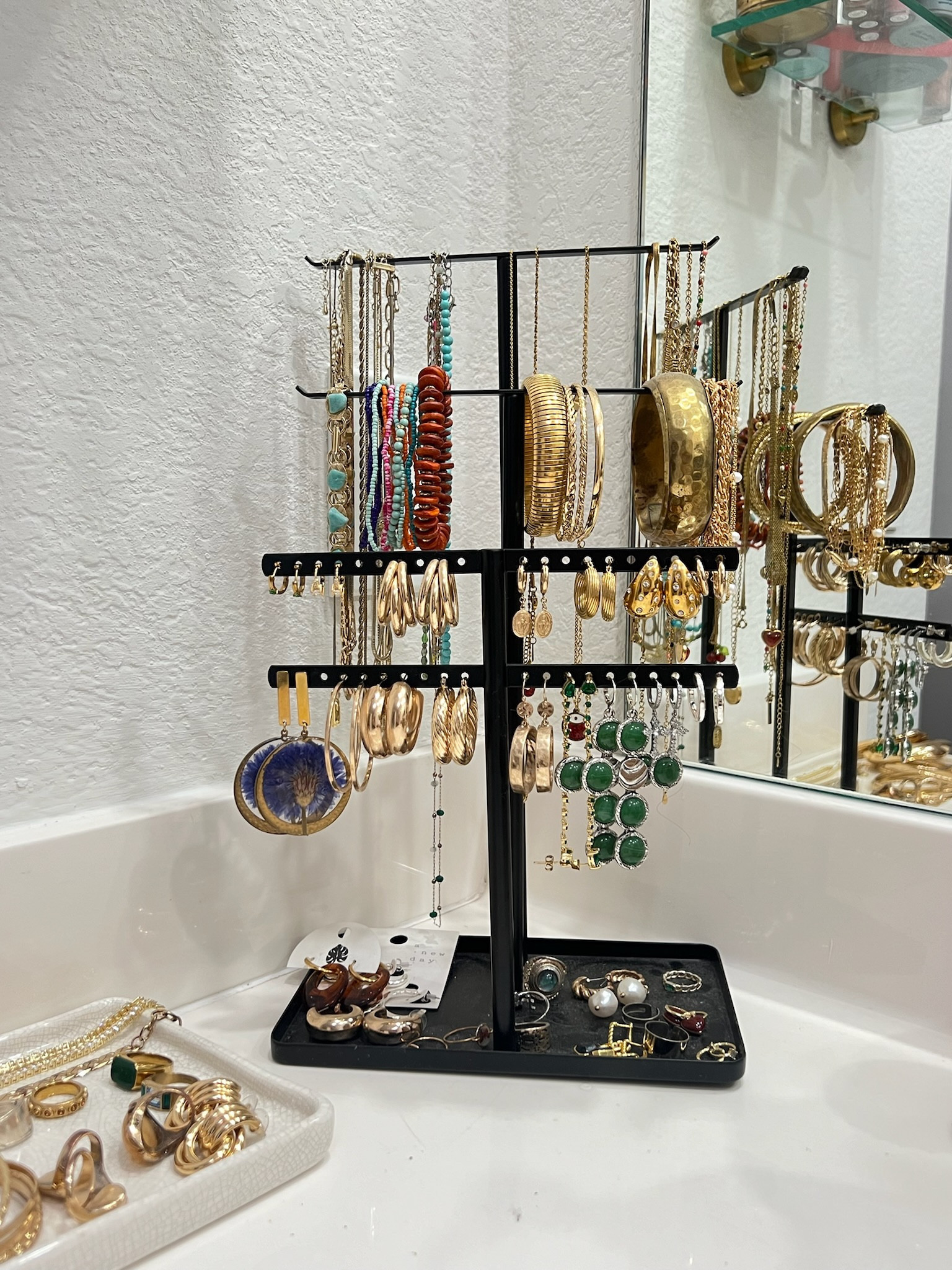 This jewelry organizer in my bathroom is seriously the best! For earrings, necklaces, bracelets, rings, etc

#LTKHome #LTKFindsUnder50 #LTKFindsUnder100