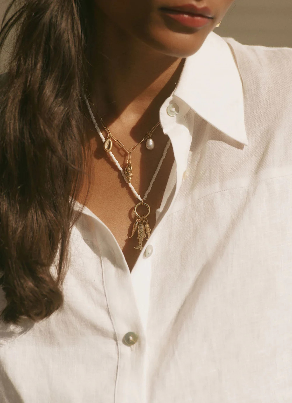 Gold Tone Fish Charm Necklace | Mint Velvet