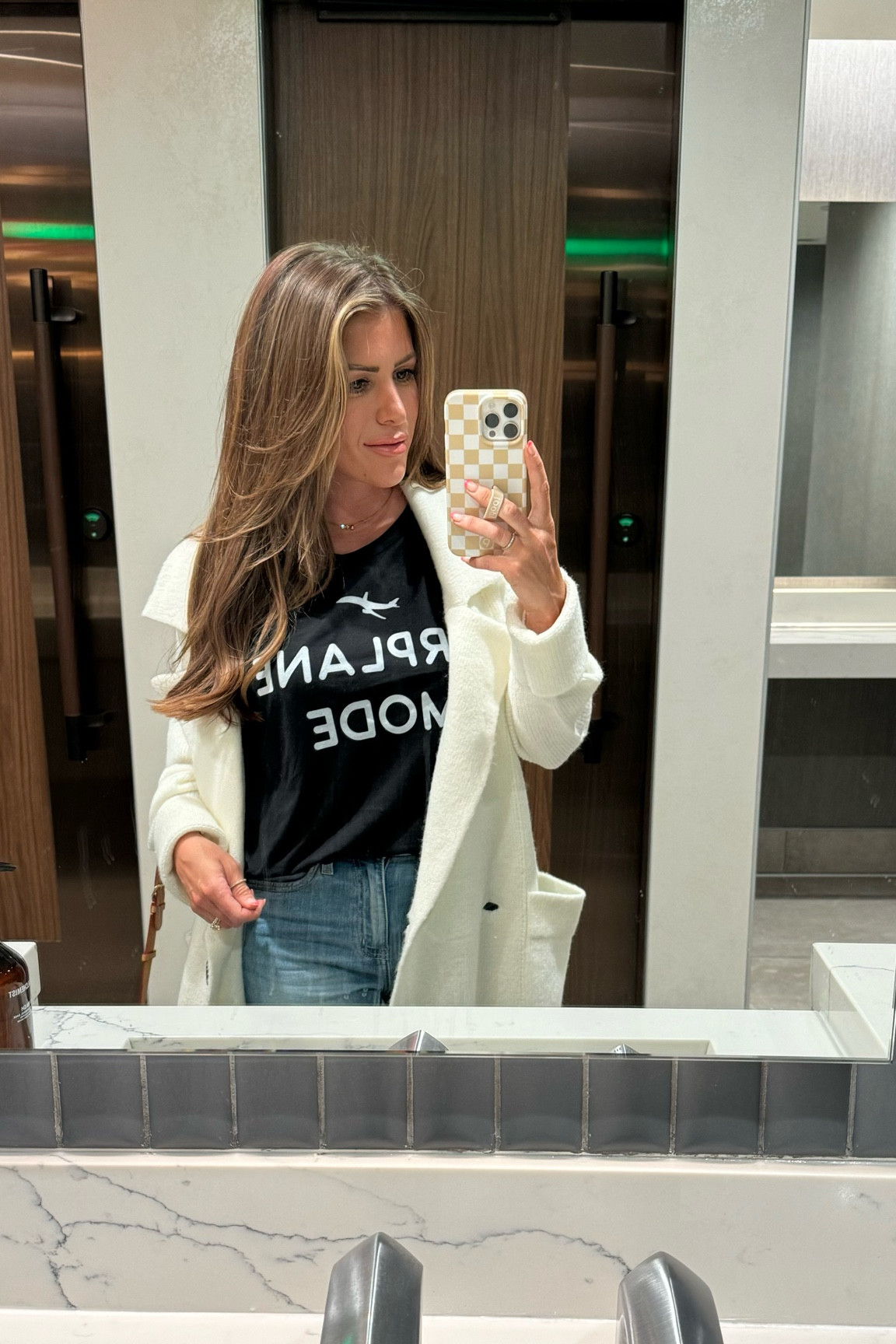 Airplane mode travel tee 
Code: JESS20 on all glitzy Bella 

#LTKtravel #LTKSeasonal