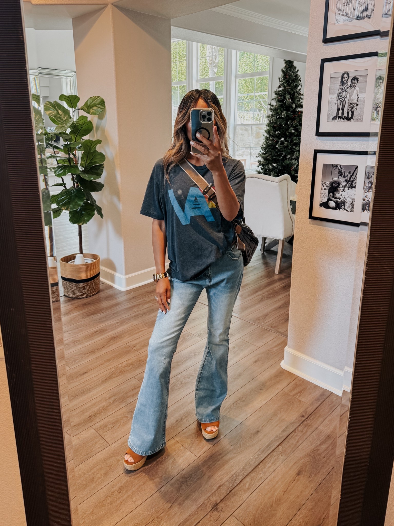 Aviator Nation t-shirt, flare jeans and wedge sandals.

#LTKStyleTip #LTKOver40 #LTKFindsUnder100