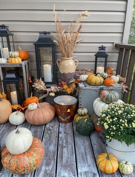 Fall porch decor, Halloween decorations, outdoor fall decorations, candle lanterns 

#LTKsalealert #LTKHalloween #LTKhome