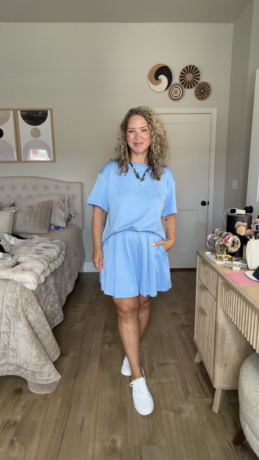 Pink cardigan and skirt size medium. White top size large 
Blue set size large (could do a medium)
White pleated tee and green striped pants size medium 
Black set size large

#LTKMidsize #LTKPetite #LTKOver40