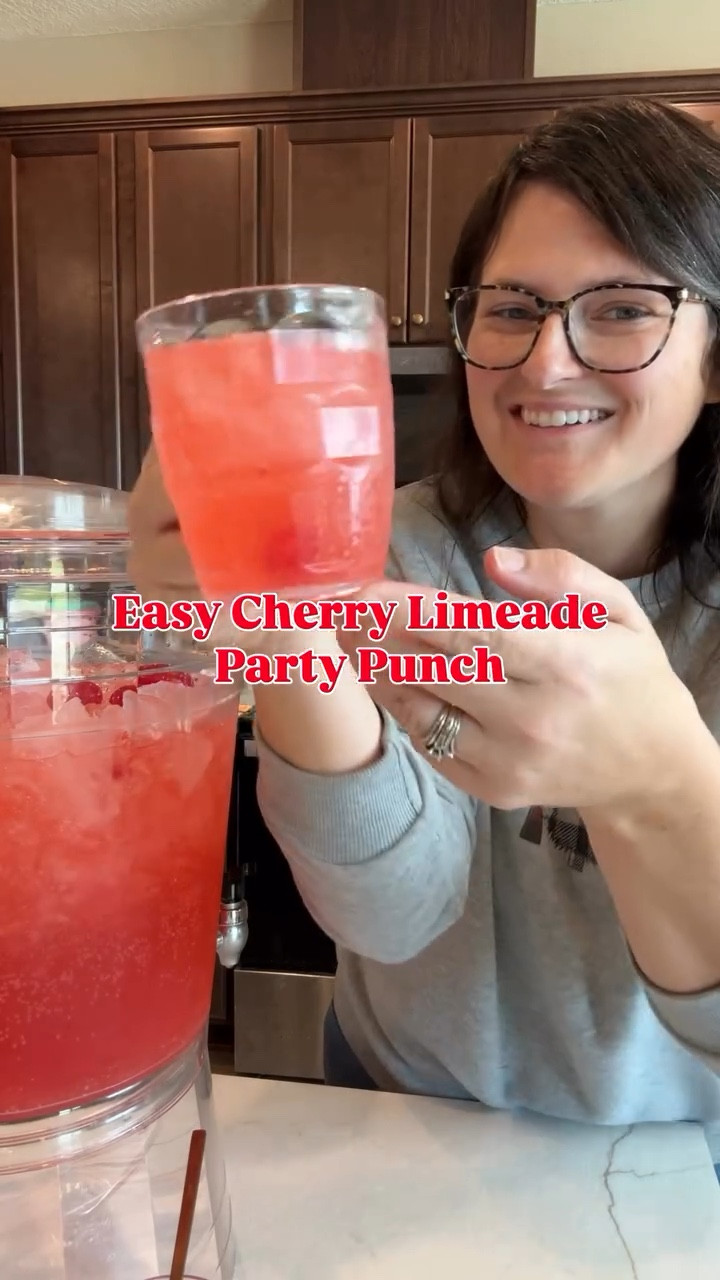 Shirley Temple Party Punch 🍒✨my favorite party drink! It’s sweet, refreshing, and looks so festive, which is perfect for someone like me who may not be a fan of all the typical holiday flavors.

Just mix Sprite, pineapple juice, and grenadine, add ice and cherries, and your punch is ready to enjoy! I measure with my heart because the heart always knows! ♥️

I’ve collected the recipe and links to things like the dispenser and party mugs all on the blog. 

#LTKHoliday #LTKfoodie