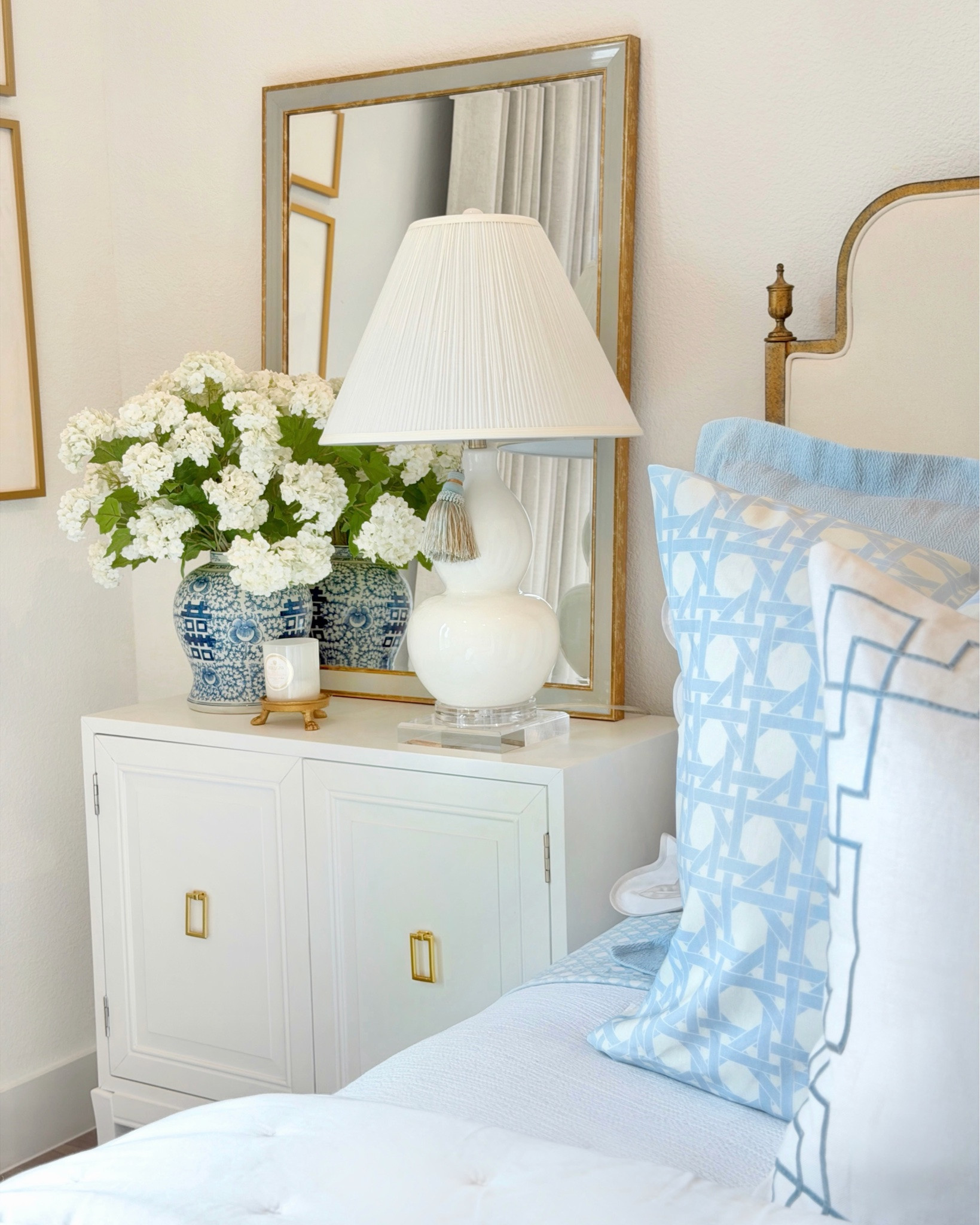 My blue and white cane euro shams are on sale for just $35!! This classic pattern is perfect for a summer refresh! 💙 If you prefer a more subtle look, my living room pillow covers feature a smaller scale version of the cane pattern. Plus, my coordinating tablecloth is also on sale—such an easy way to add a pop of color and pattern to your dining table!Just a heads up, these are made to order items so they take at least 3 weeks for arrive, but are absolutely worth the wait! 😍

#bedroomdesign #summerdecor #traditionalhome #eleganthome #bedroomstyling traditional home decor summer decor blue and white chinoiserie ginger jar nighstand styling Amazon target tjmaxx ltk liketkit interiors frontgate Spoonflower coastal decor coastal style
