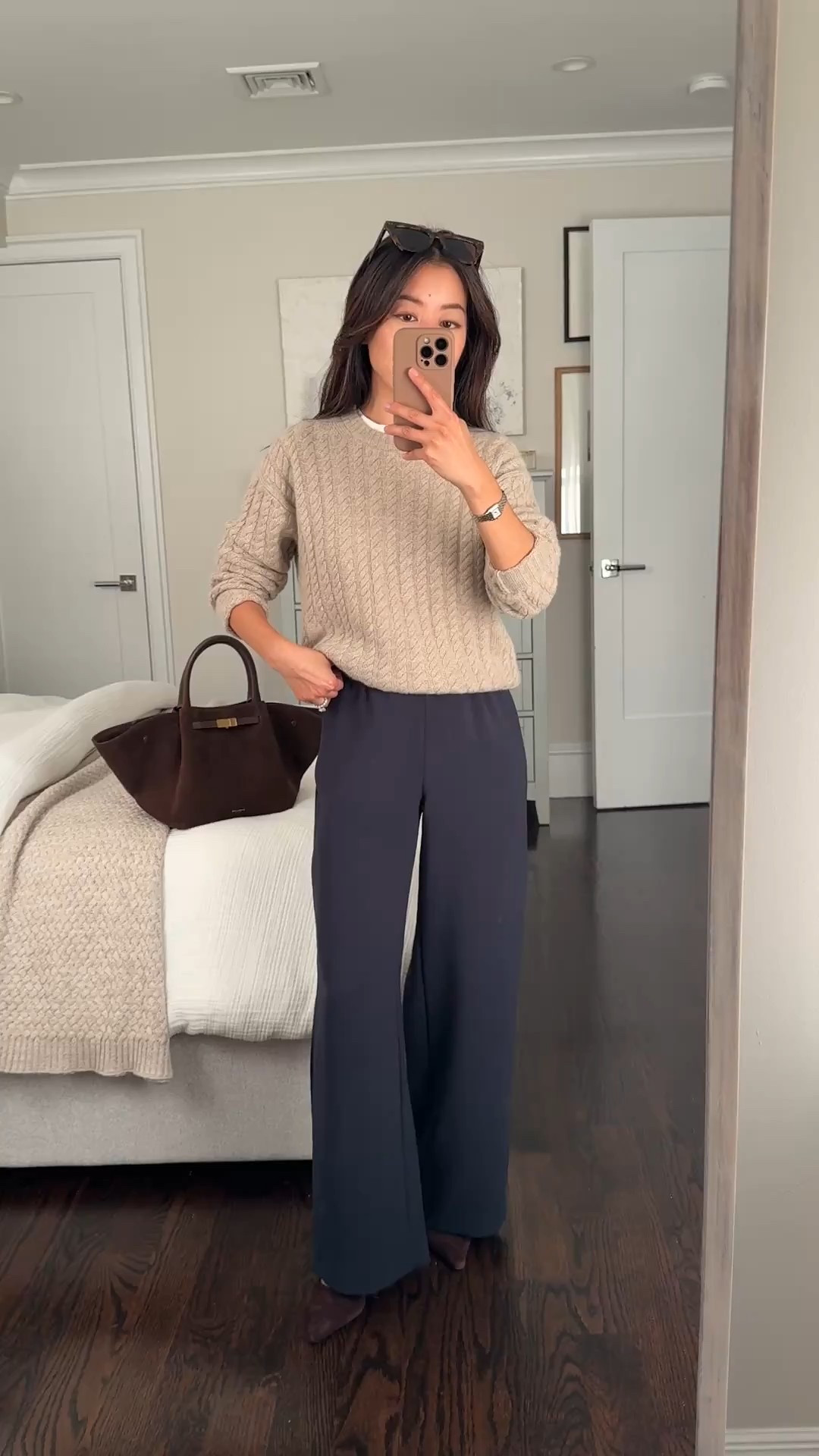 Elevated staples that feel luxe -

• jcrew cable cashmere sweater xxs sleeves a little long on me also have the sweater tee version from years past 

• aritzia drapey pull on  lodge pants 2XS short , since short is always sold out it’s worth getting in regular sizing and hemming IMO

• white Everlane tee Xs (size up) work backwards so the collar is higher and peeks out 

• sam Edelman sling backs 5.5

• demellier bag

Classic work wear that’s comfortable, petite friendly trouser pants with stretch waist 

#LTKWorkwear #LTKPetite #LTKSeasonal