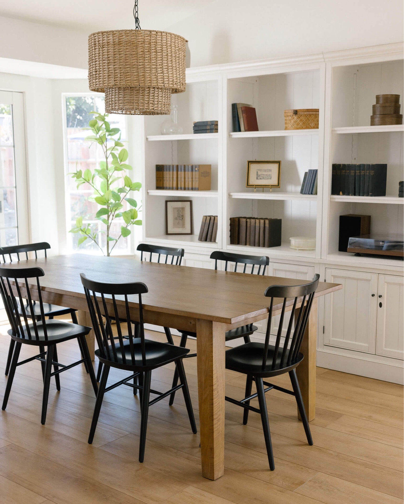 Dining room design inspiration. Dining chairs, dining table, bookcase, pendant light. 

#LTKHome
