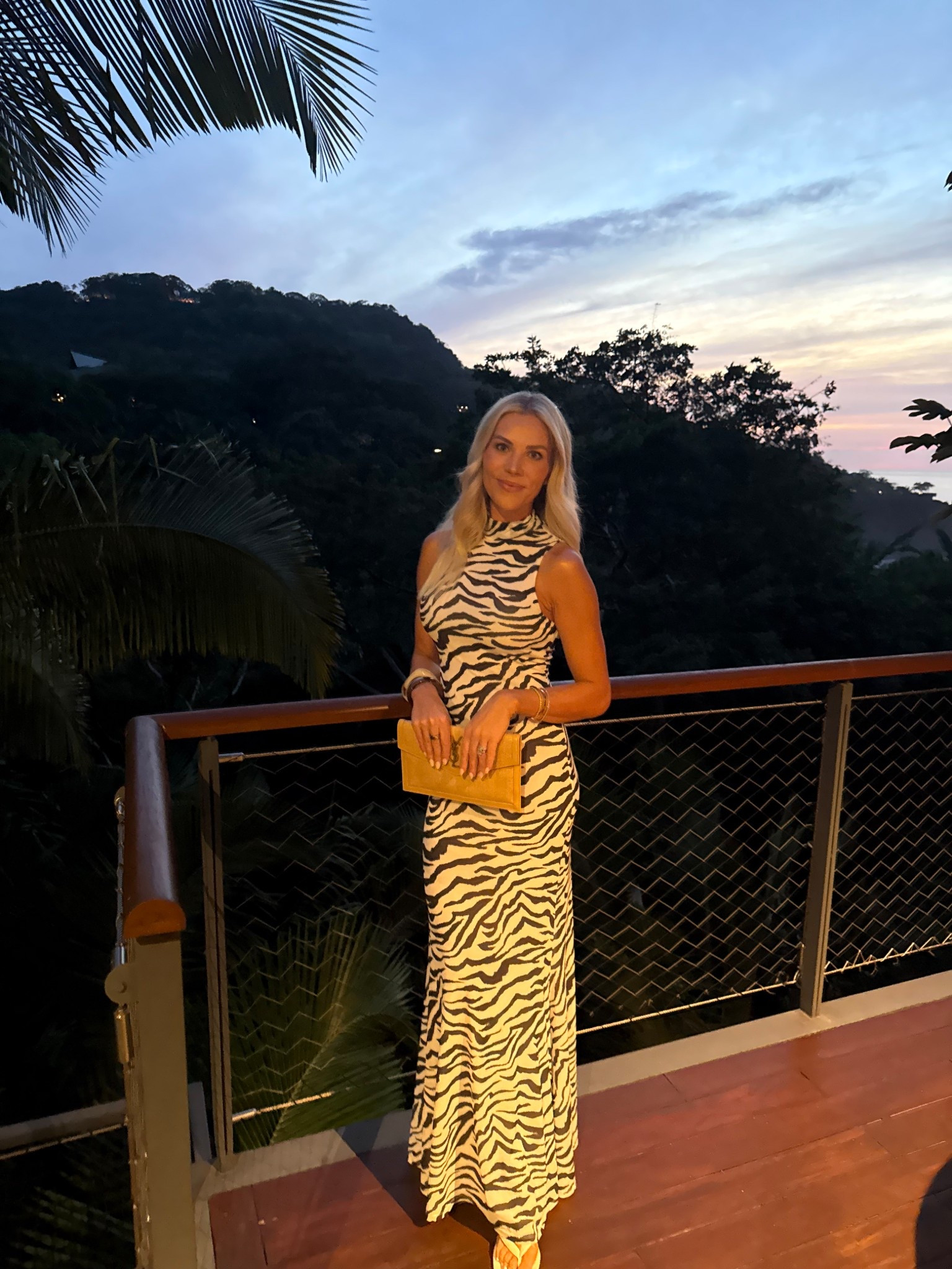 Zebra maxi dress size small
White heel sandals true to size 
Ysl clutch 


#LTKootd #LTKSaleAlert #LTKTravel