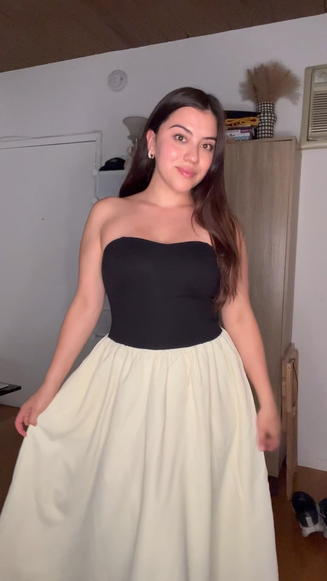 This classic black and white outfit is a timeless look that’s perfect for any occasion. The strapless black top adds a sleek and flattering touch, while the full cream skirt brings a soft, romantic feel. Shop this elegant look on LTK by searching for neutral outfits, summer dresses, and minimal style staples.

#LTKWorkwear #LTKTravel #LTKParties