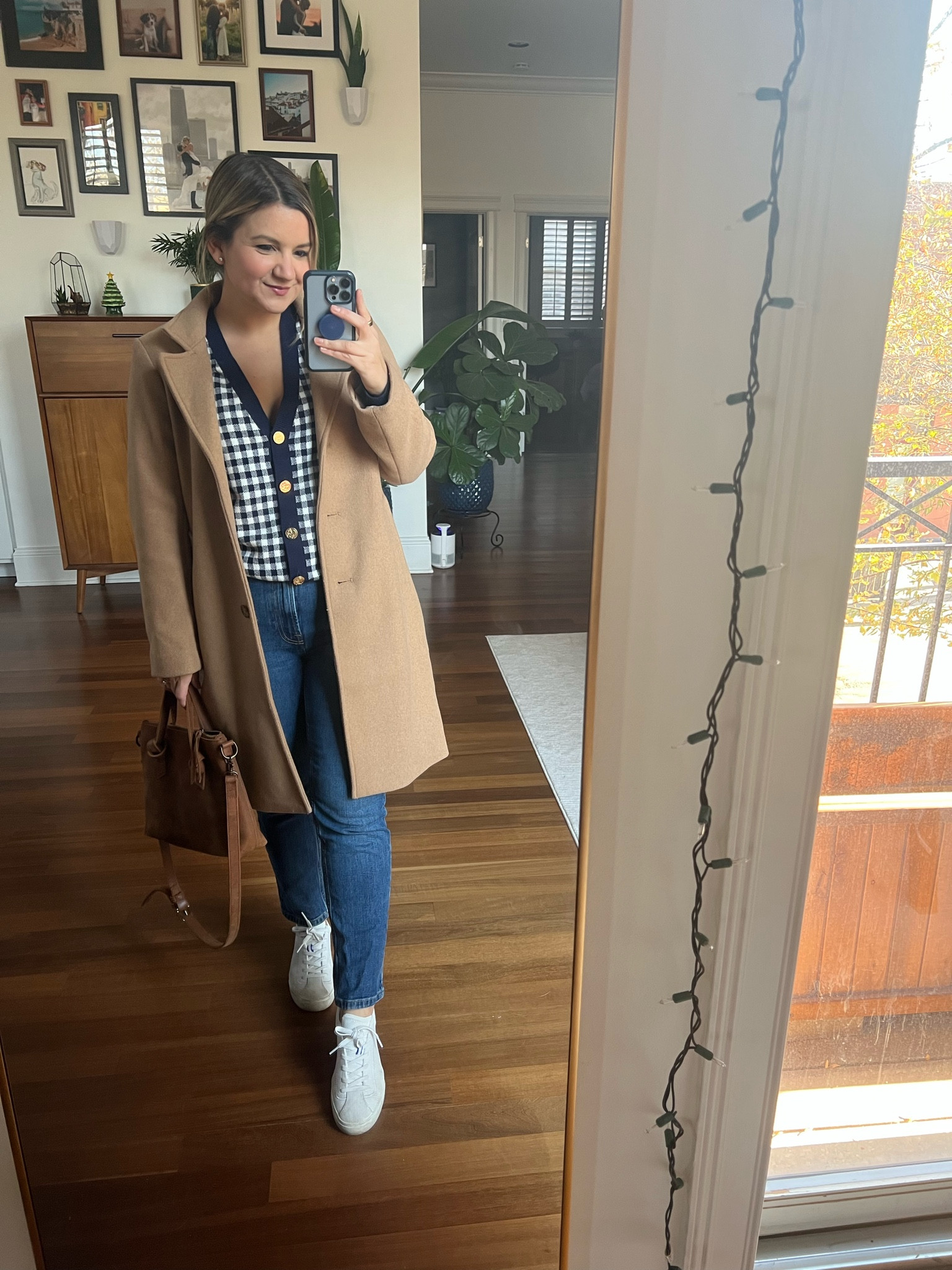 My entire outfit is on sale this week! 
Camel coat - petite small
Gingham sweater - size XS
Jeans - size 26 in the short inseam for petites (they also have 2 longer inseams too!)
Sneakers - size up if between sizes!
Leather Bag - 40% off with code LAURENNHOLIDAY40 

#LTKGiftGuide #LTKCyberweek #LTKsalealert