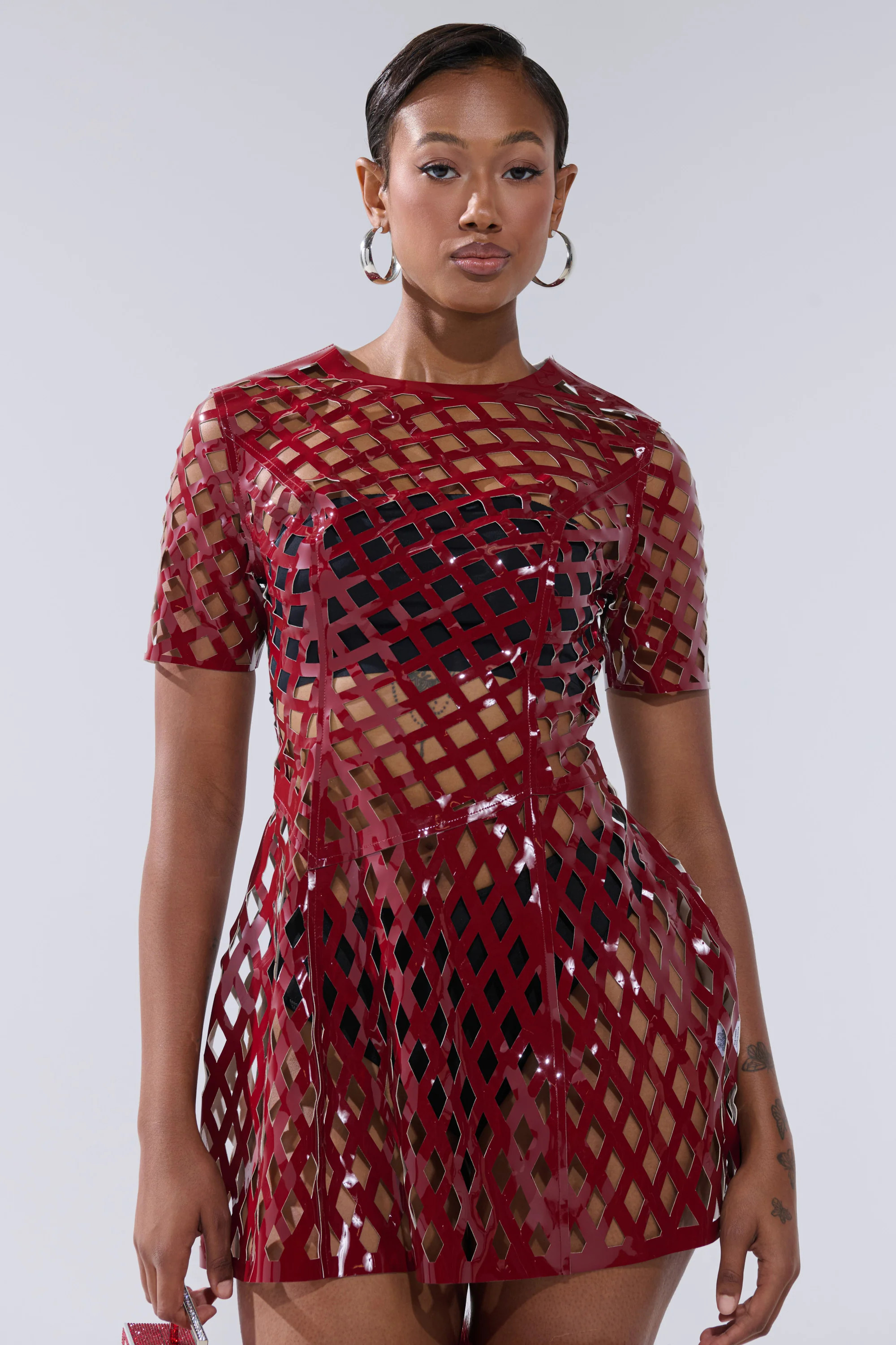 SHE'S DIFFERENT CUT OUT FAUX LEATHER MINI DRESS IN BURGUNDY | AKIRA