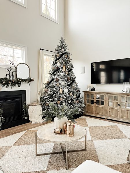 Christmas tree, holiday, area rug, living room, holiday decor, bells, garland, ornaments, family room, mantel

#LTKSeasonal #LTKhome #LTKHoliday