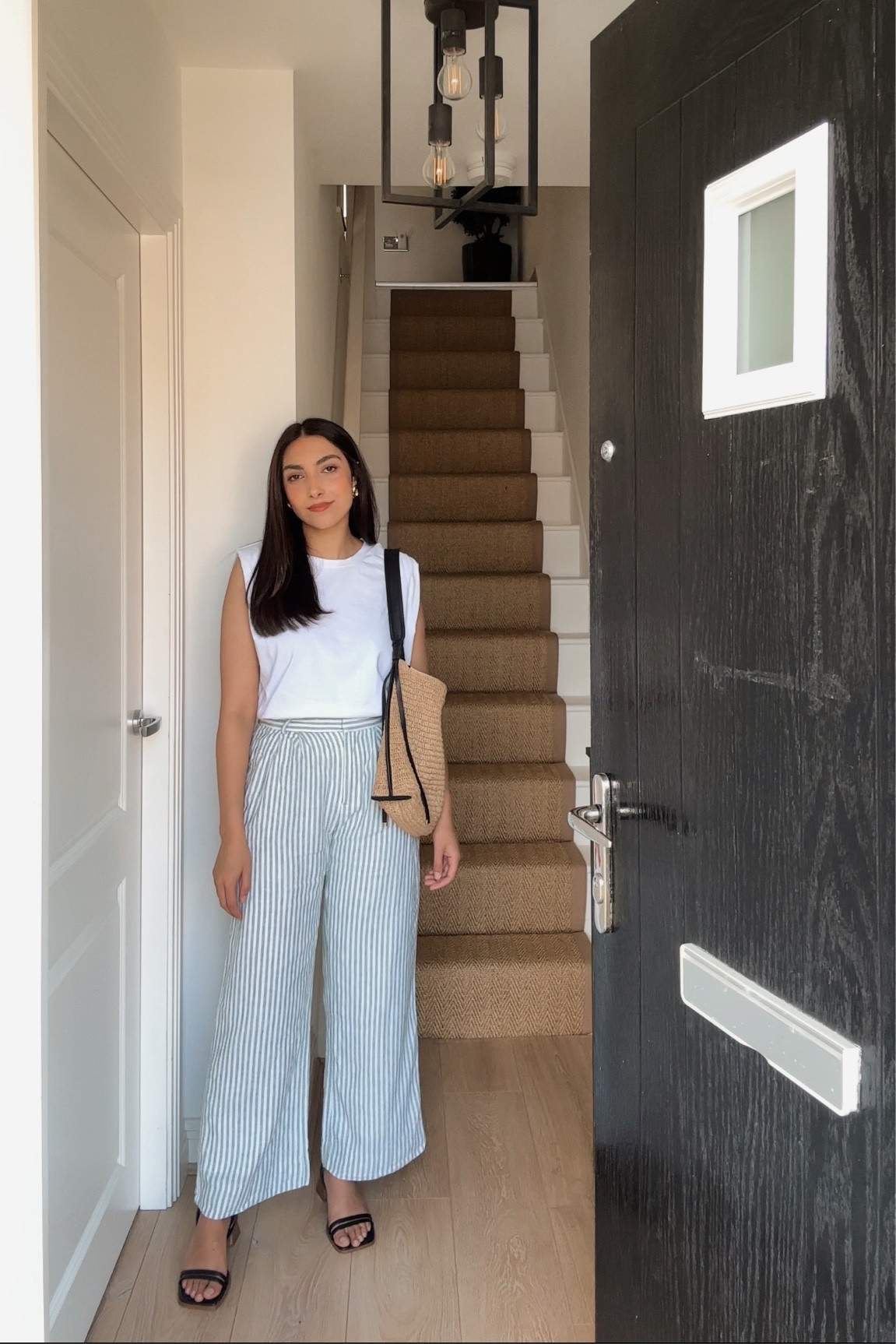 Stripy linen trousers, sloan linen trousers, linen trousers, fully linen linen trousers, abercrombie, shoulder pad sleeveless t shirt, white sleeveless top, sleeveless top, casual summer outfit, summer inspiration, raffia bag, &otherstories 

#LTKSeasonal #LTKeurope #LTKstyletip