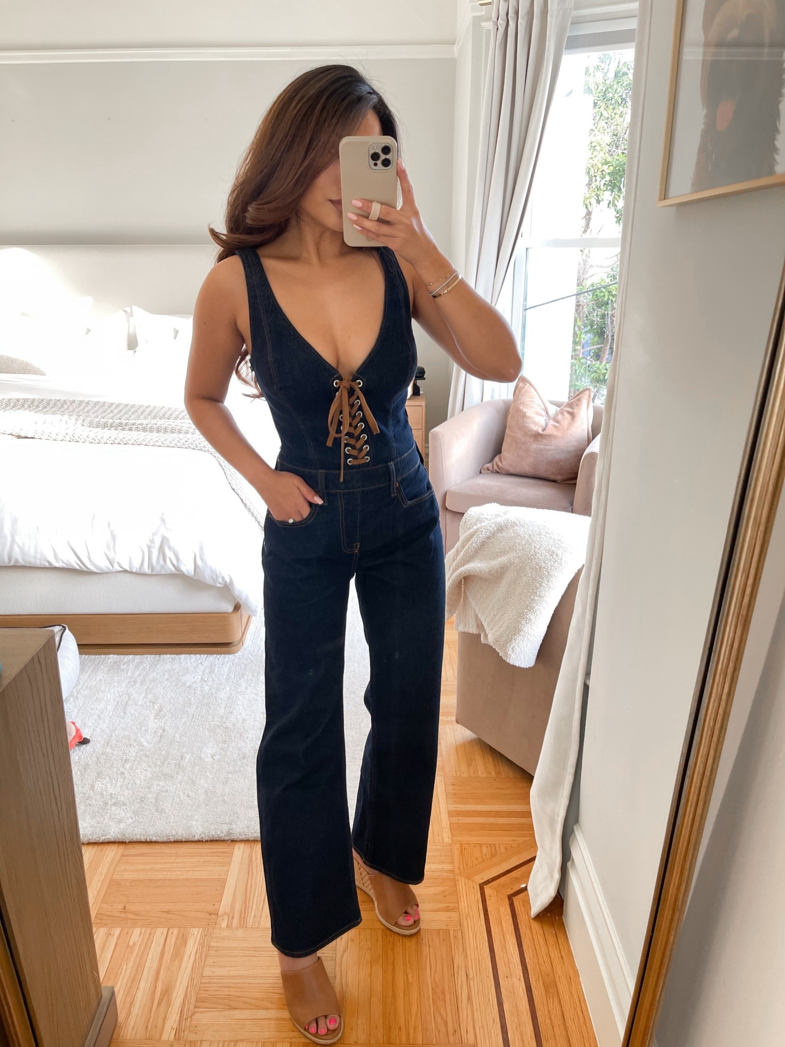 This denim jumpsuit would be so cute for a concert or show! TTS, wearing xs petite and the strap length is adjustable 

Wedges are old, linked similar  

#LTKPetite #LTKootd