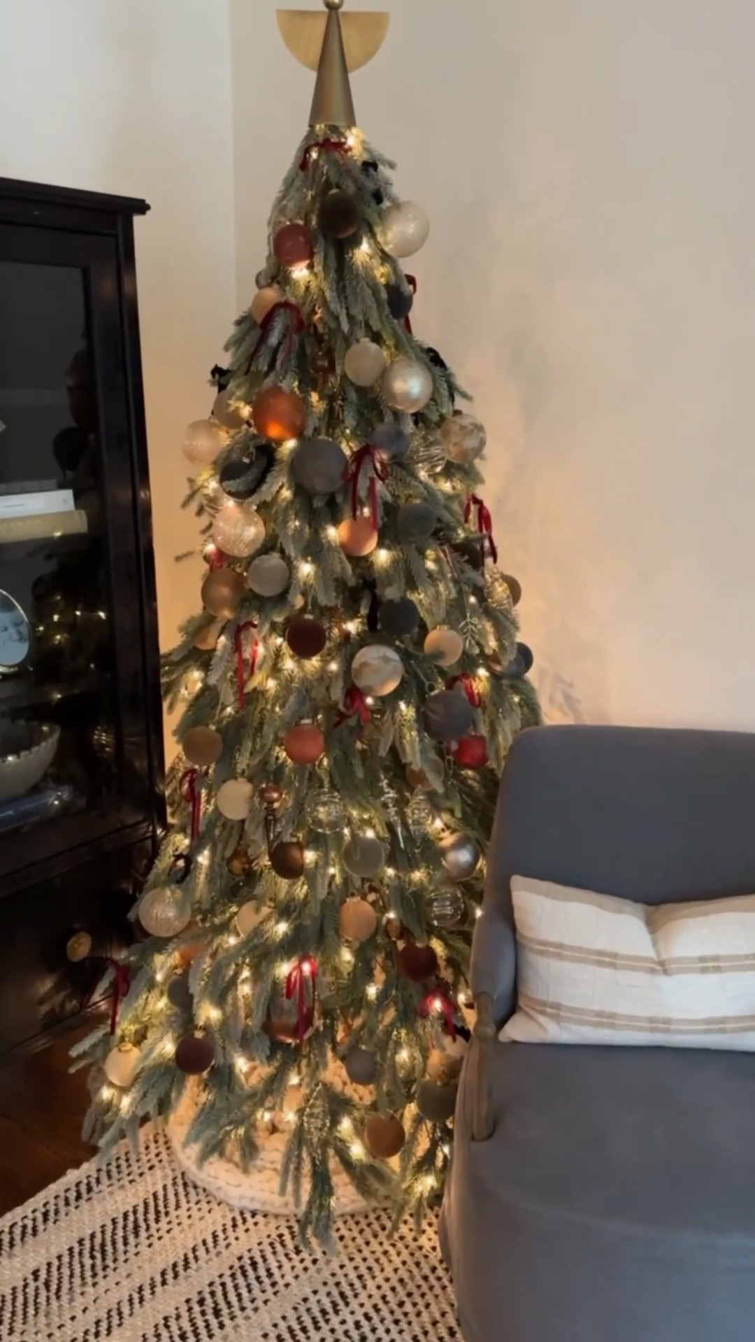 Our 2025 tree that is usually sold out!🎄✨ Get while you can! 

I had this down swept tree on my wishlist for awhile & got it last year for our first Christmas in our new home. I love that it is mostly green, with a light flocking that feels nostalgic in a way. I wanted it to feel collected & fit in well with our almost 100 year old house. I love how it turned out & can’t wait to continue to add to it over the years!

#LTKSeasonal #LTKHome