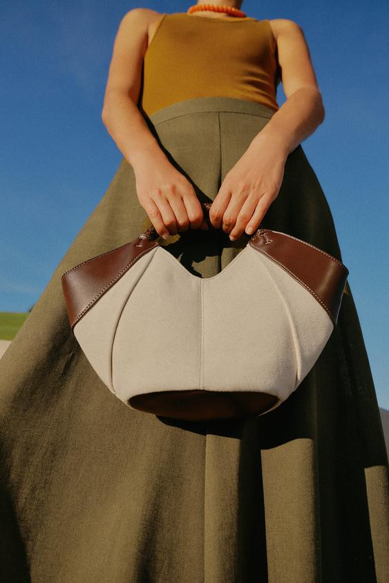 Mini shopper bag. Contrasting topstitching on the body. Double braided handles and a removable cr... | Zara US