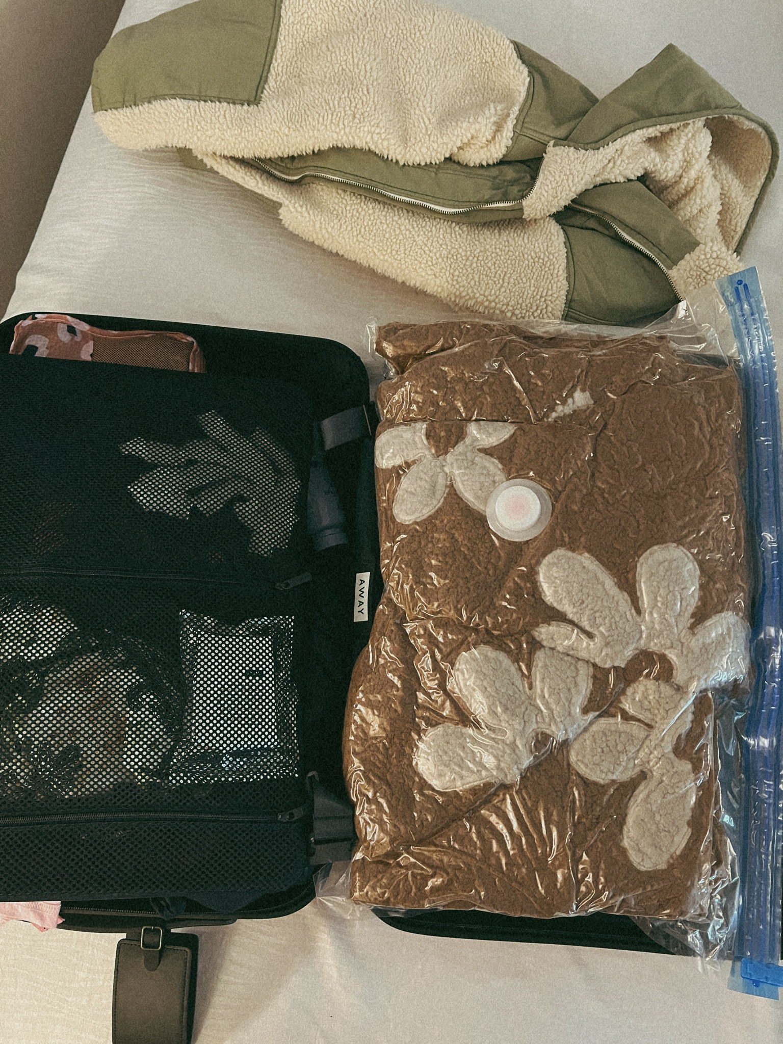 Packing hack for bulky items! Vacuum seeled bags from Amazon!

#LTKSeasonal #LTKTravel #LTKStyleTip