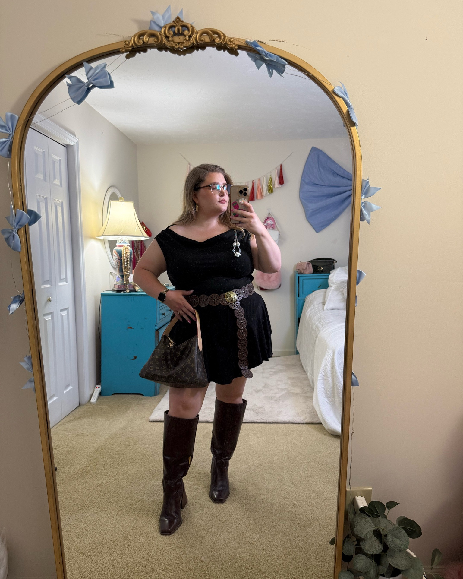 Plus size outfit of the day • western style plus size outfit perfect for a country concert! • I love this black off the shoulder top paired with a layered skirt and western style belt and boots for an elevated western style look!

#LTKootd #LTKPlusSize #LTKMidsize