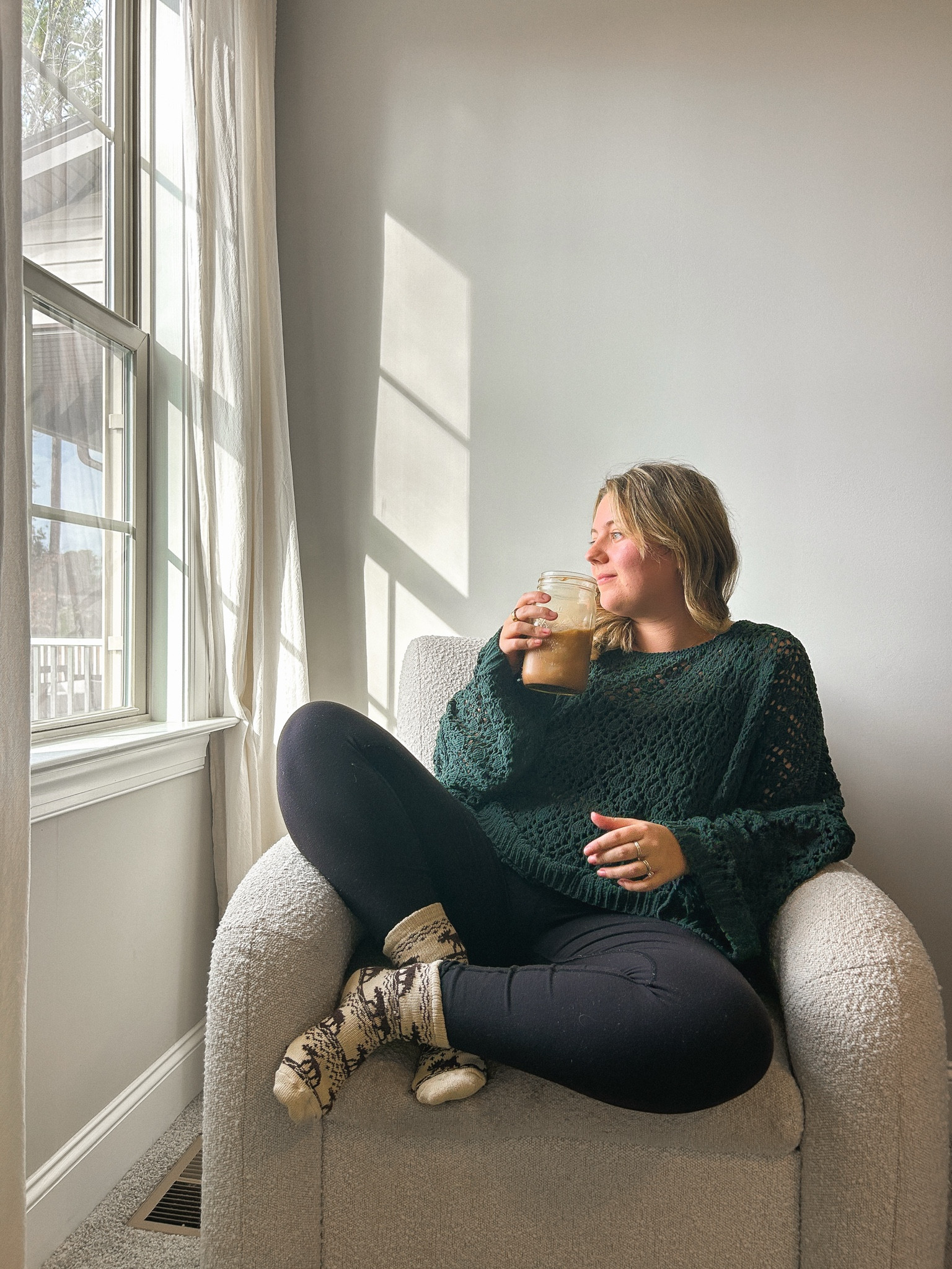 A giant iced coffee is balanced out by this giant oversized green sweater and some cozy patterned wool socks. Loving this cozy season!!

#LTKmomlife #LTKSeasonal