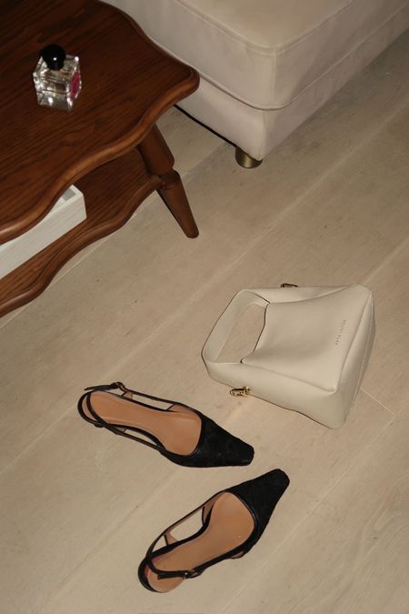 Black slingback heels, white leather handbag 

#LTKstyletip #LTKeurope #LTKSeasonal