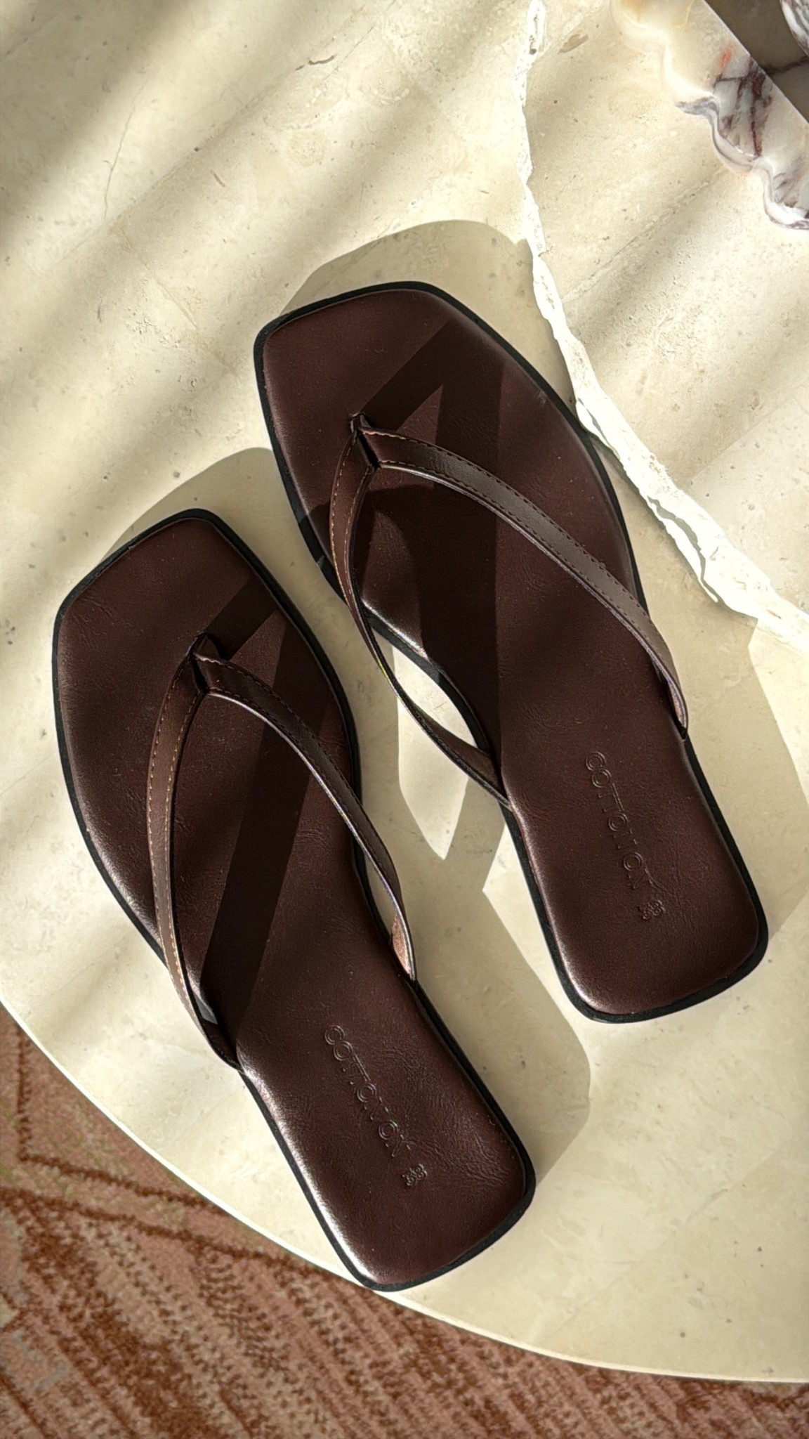 Brown leather look thongs 

#LTKshoes #LTKstyletip #LTKspring