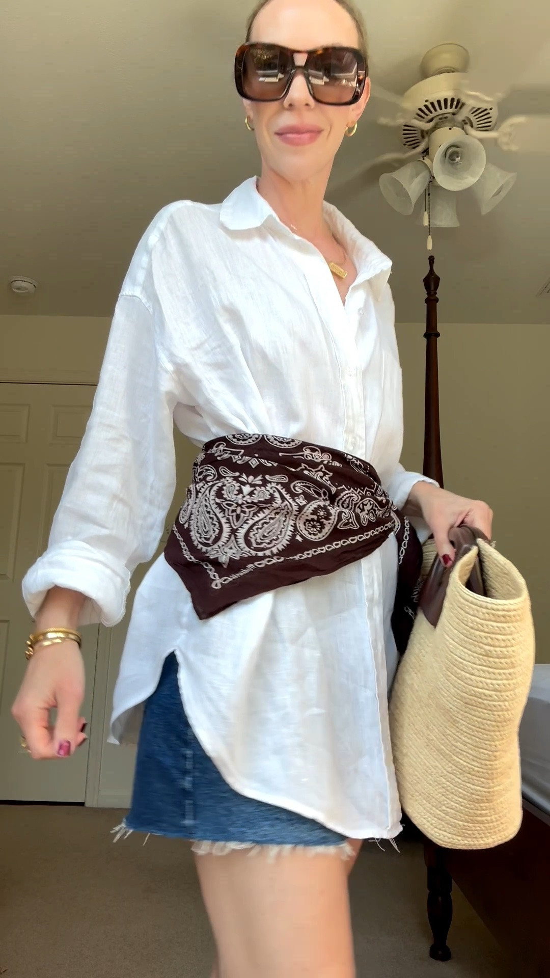 Transitional summer to fall outfit idea with oversized linen shirt, bandana scarf worn as belt, denim shorts and straw tote bag

#LTKSeasonal #LTKOver40 #LTKSaleAlert